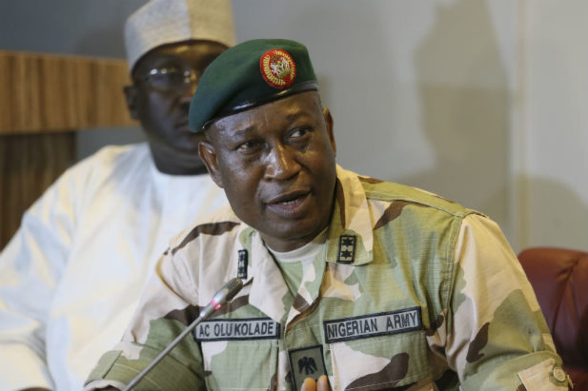 Director of Defence Information, Major General Chris Olukolade addresses the media as they parade the suspected bombers responsible for the Nyanya bus park bomb in Abuja, May 12, 2014.