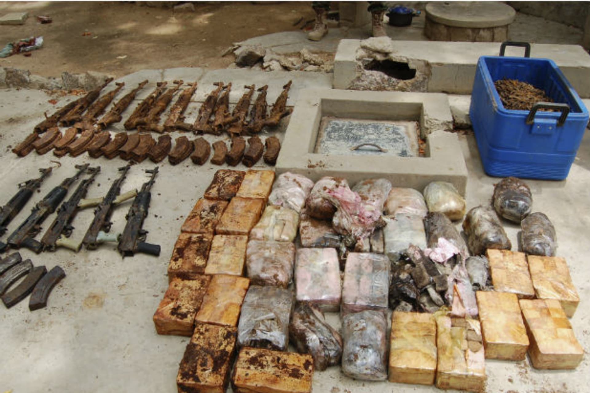 Ammunition and explosives seized from suspected members of Hezbollah are displayed after a raid of a building in Nigeria's northern city of Kano May 30, 2013.