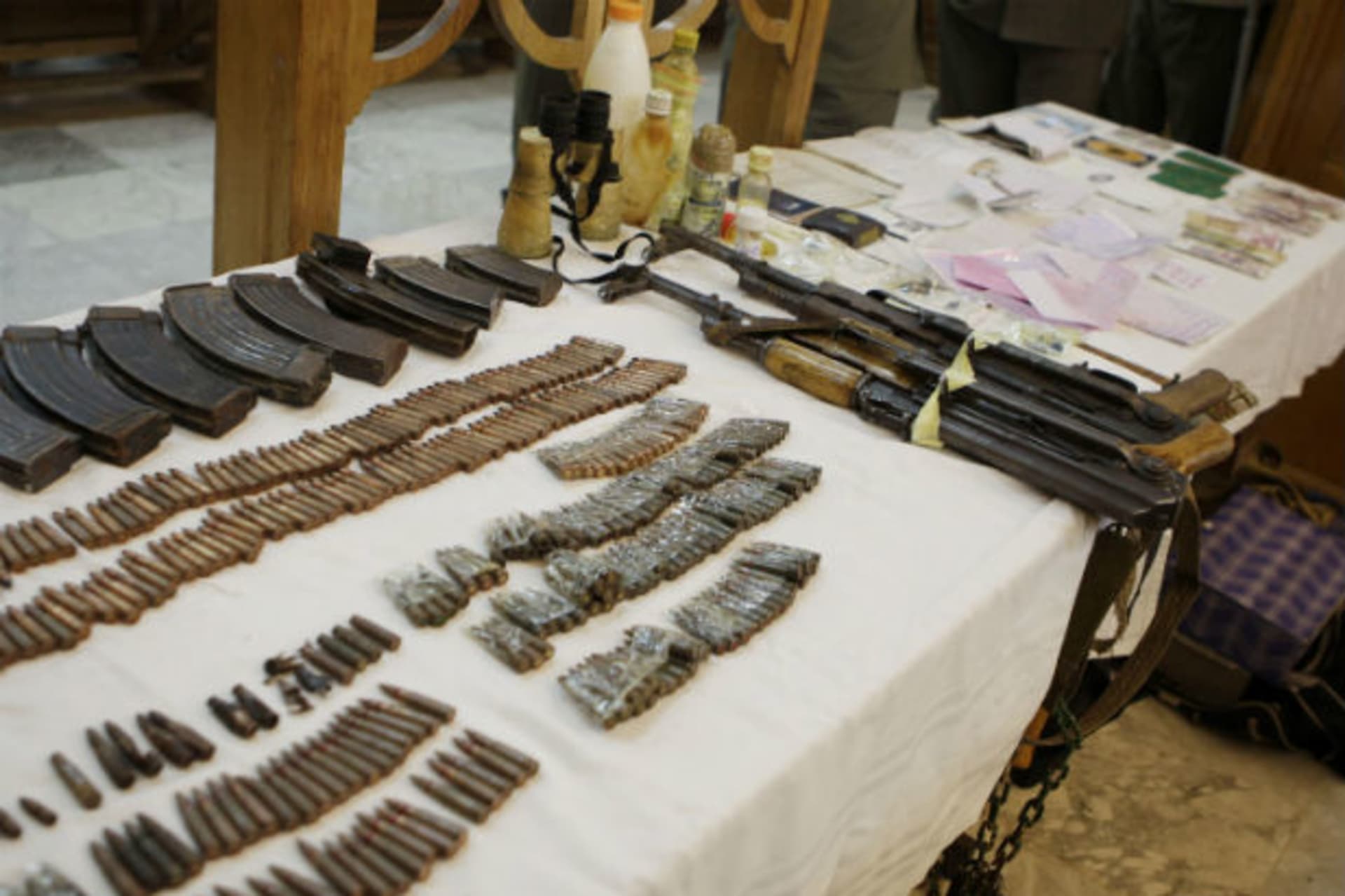 Evidence is displayed during a hearing for suspected members of al Qaeda in the Islamic Magreb (AQIM) at a military court in Tunis June 9, 2012.