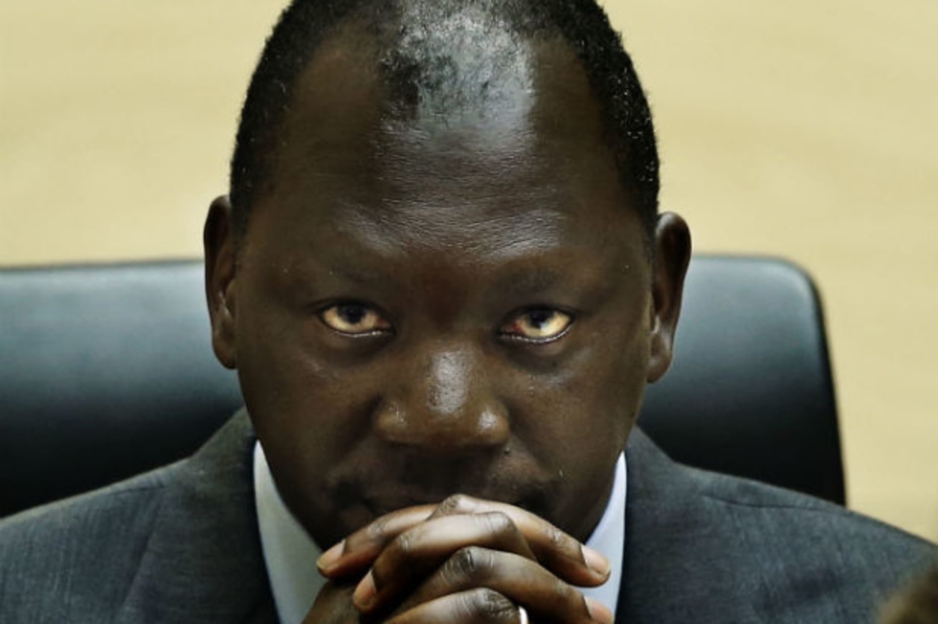 Congolese warlord Thomas Lubanga Dyilo listens to the first sentence delivered by the International Criminal Court (ICC), at the ICC courtroom in the Hague July 10, 2012.