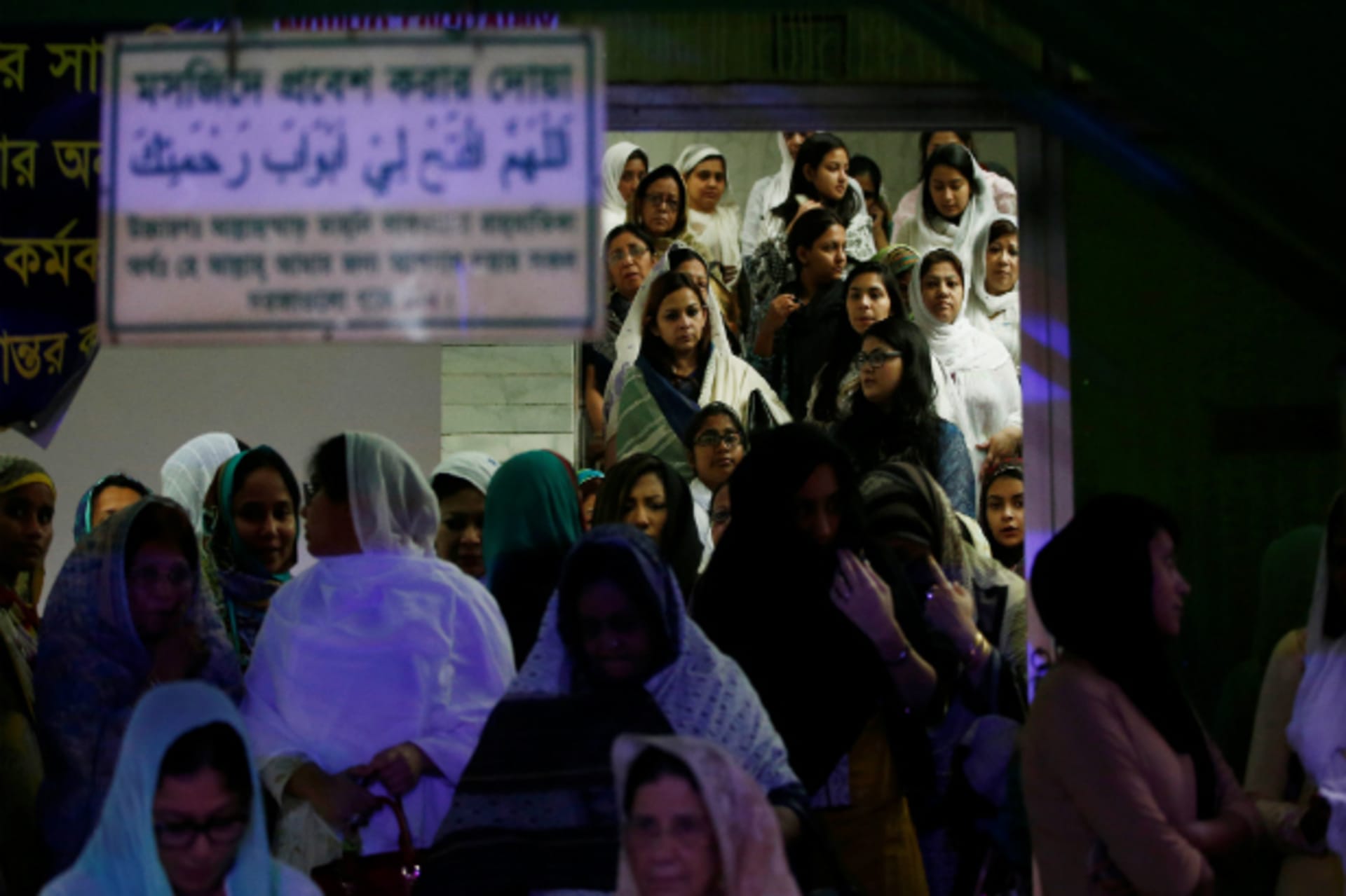 <p>Relatives and friends leave after attending the funeral prayer of the victims who were killed in the attack on the Holey Artisan Bakery and the O’Kitchen Restaurant, in Dhaka, Bangladesh, July 4, 2016 (Adnan Abidi/REUTERS).</p>
