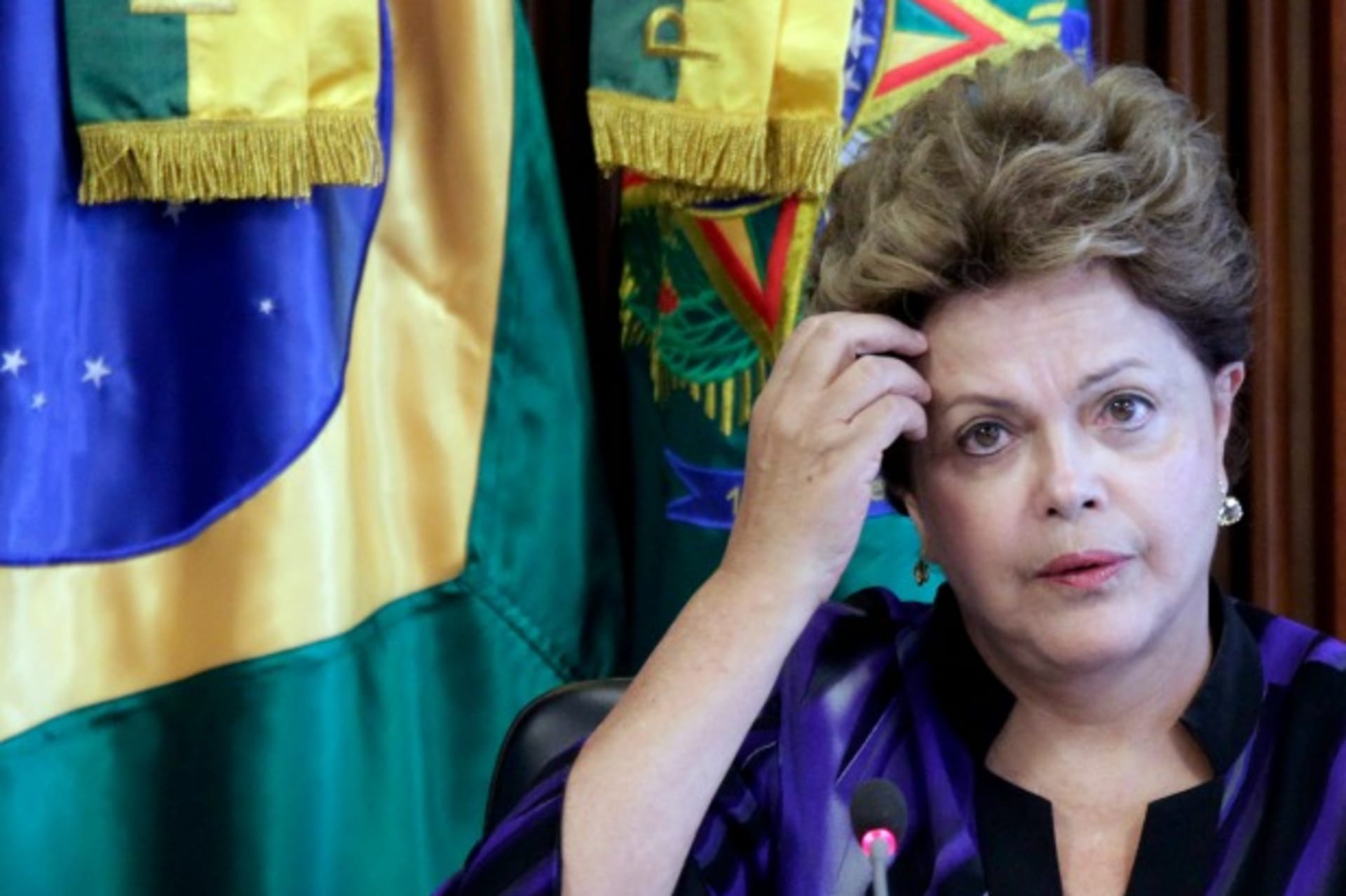 <p>Brazil’s President Dilma Rousseff reacts during a meeting of the National Council for Scientific and Technological Development at the Planalto Palace in Brasilia on February 6, 2013. (Ueslei Marcelino/Courtesy Reuters)</p>
