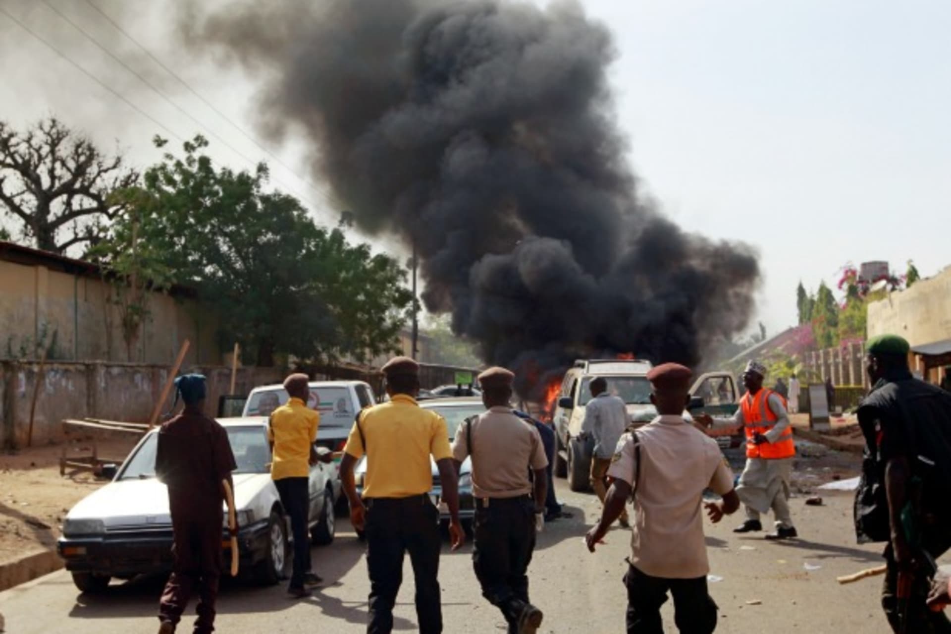 Security Personnel Rush towards a car bomb