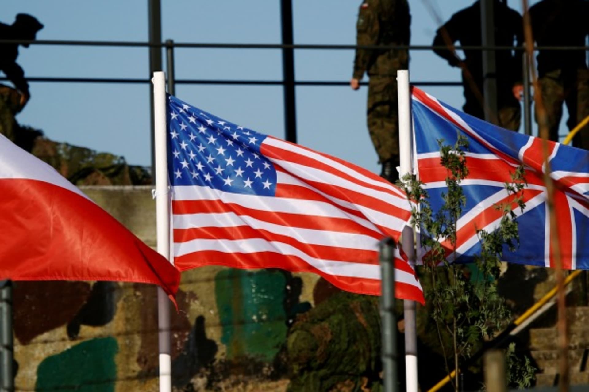 <p>Polish, U.S., and British flags are seen during the NATO allies’ Anakonda 16 exercise near Torun, Poland, on June 7, 2016.</p>
