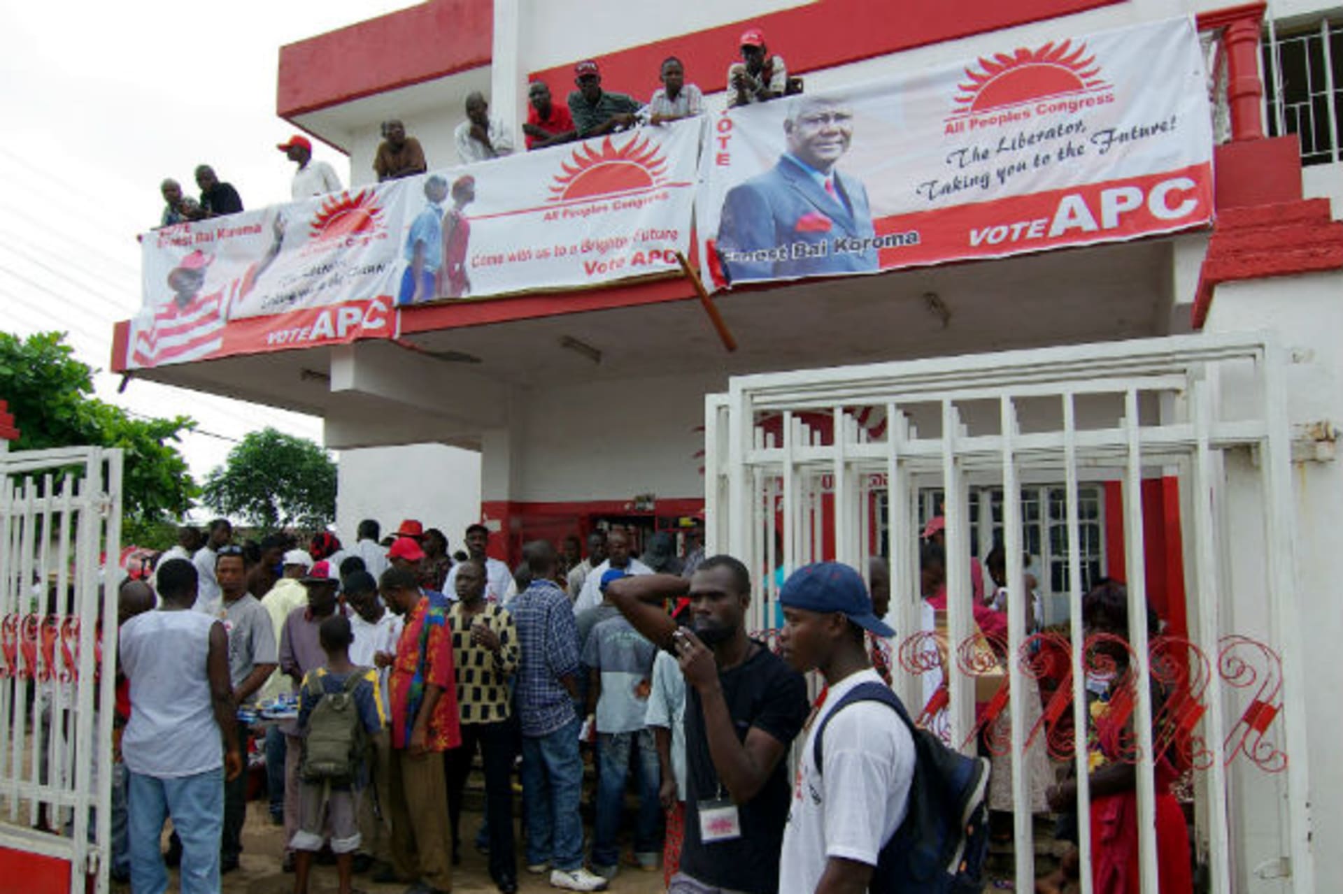 Sierra Leone's opposition party All People?s Congress supporters mingle outside their party headquarters in Freetown 26/07/2007.