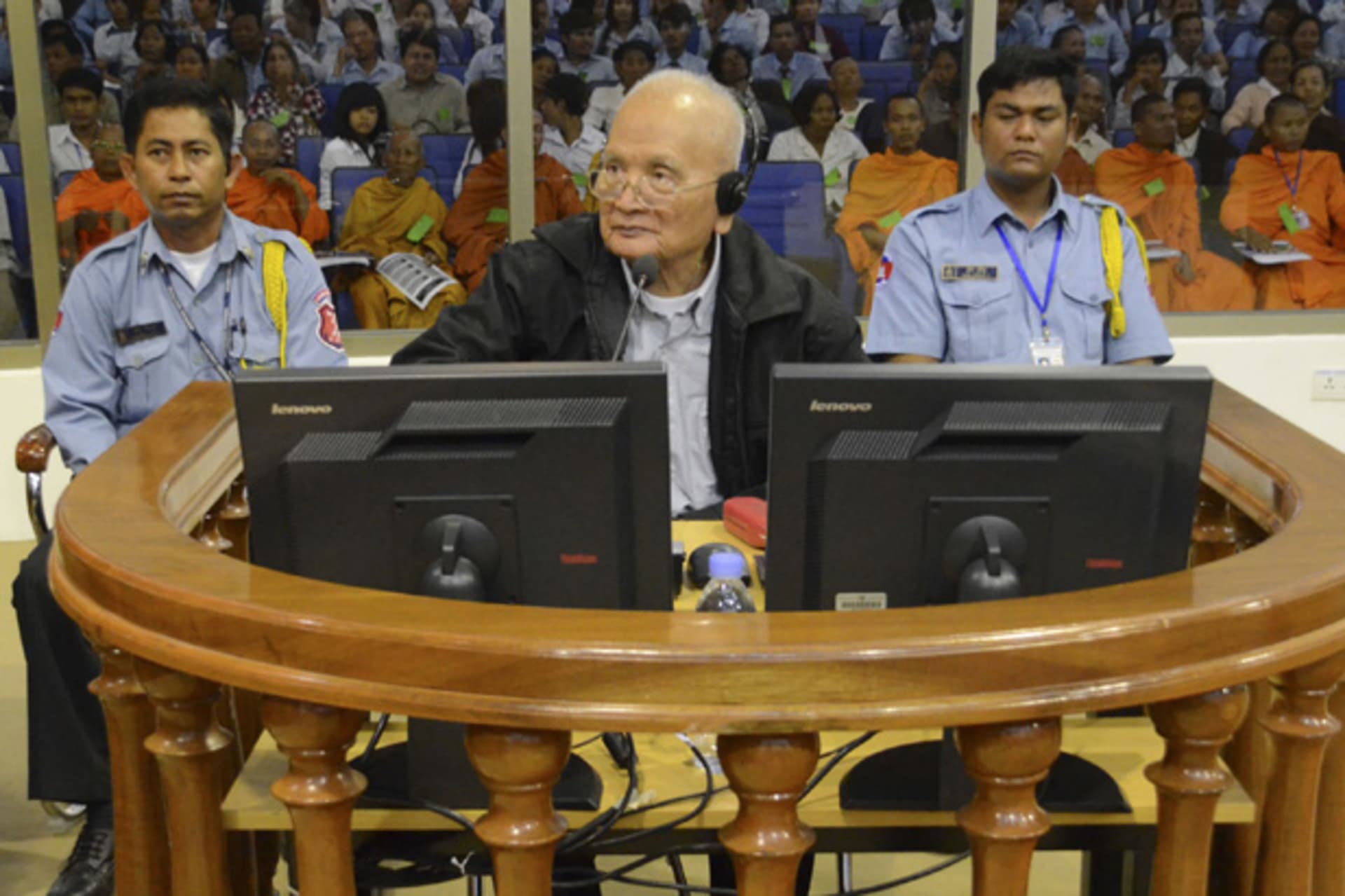 <p>Former Khmer Rouge leader “Brother Number Two” Nuon Chea (C) sits in the court room at the Extraordinary Chambers in the Courts of Cambodia (ECCC) on the outskirts of Phnom Penh, December 5, 2011.</p>
