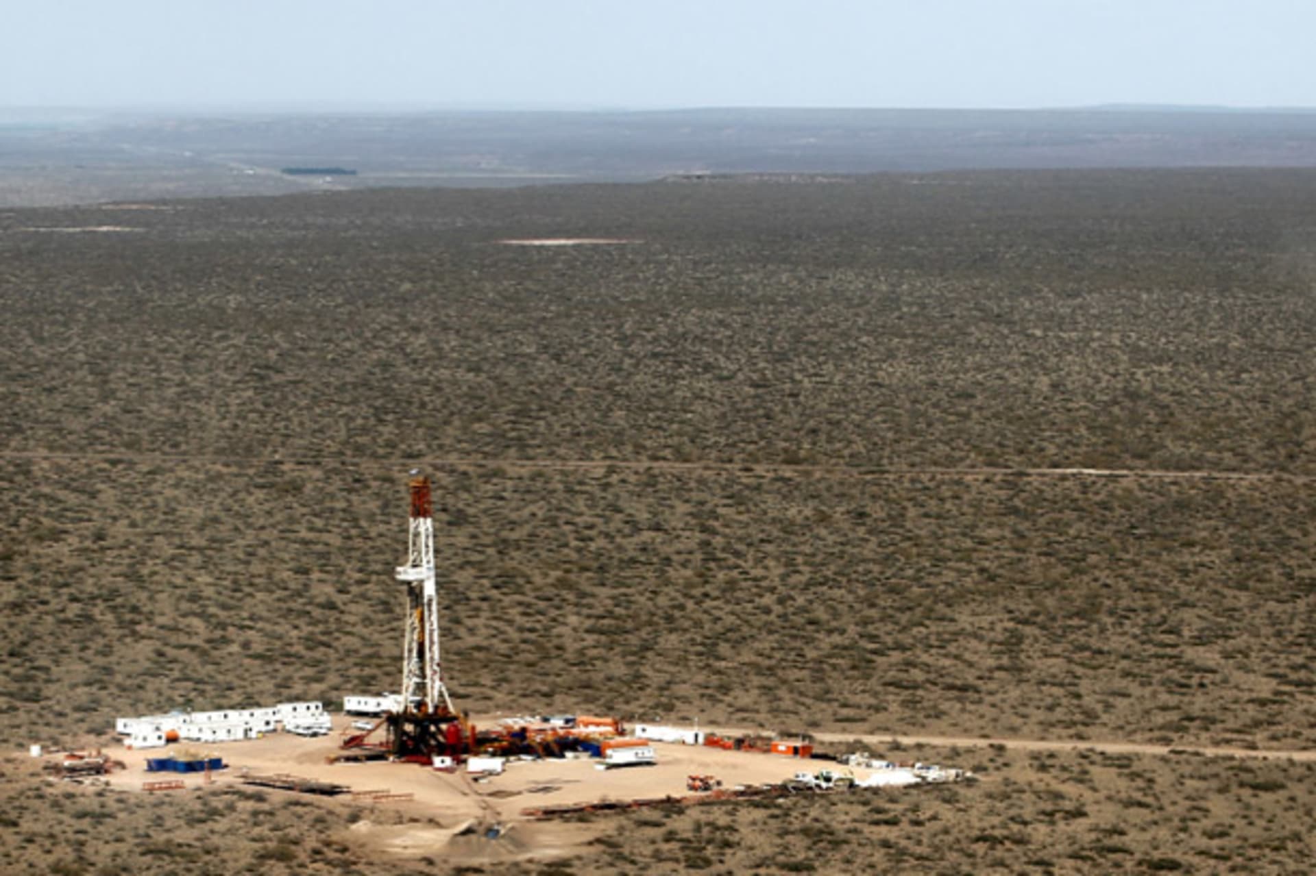 An aerial view of the shale oil drilling rig SAI-307 in the Patagonian province of Neuquen