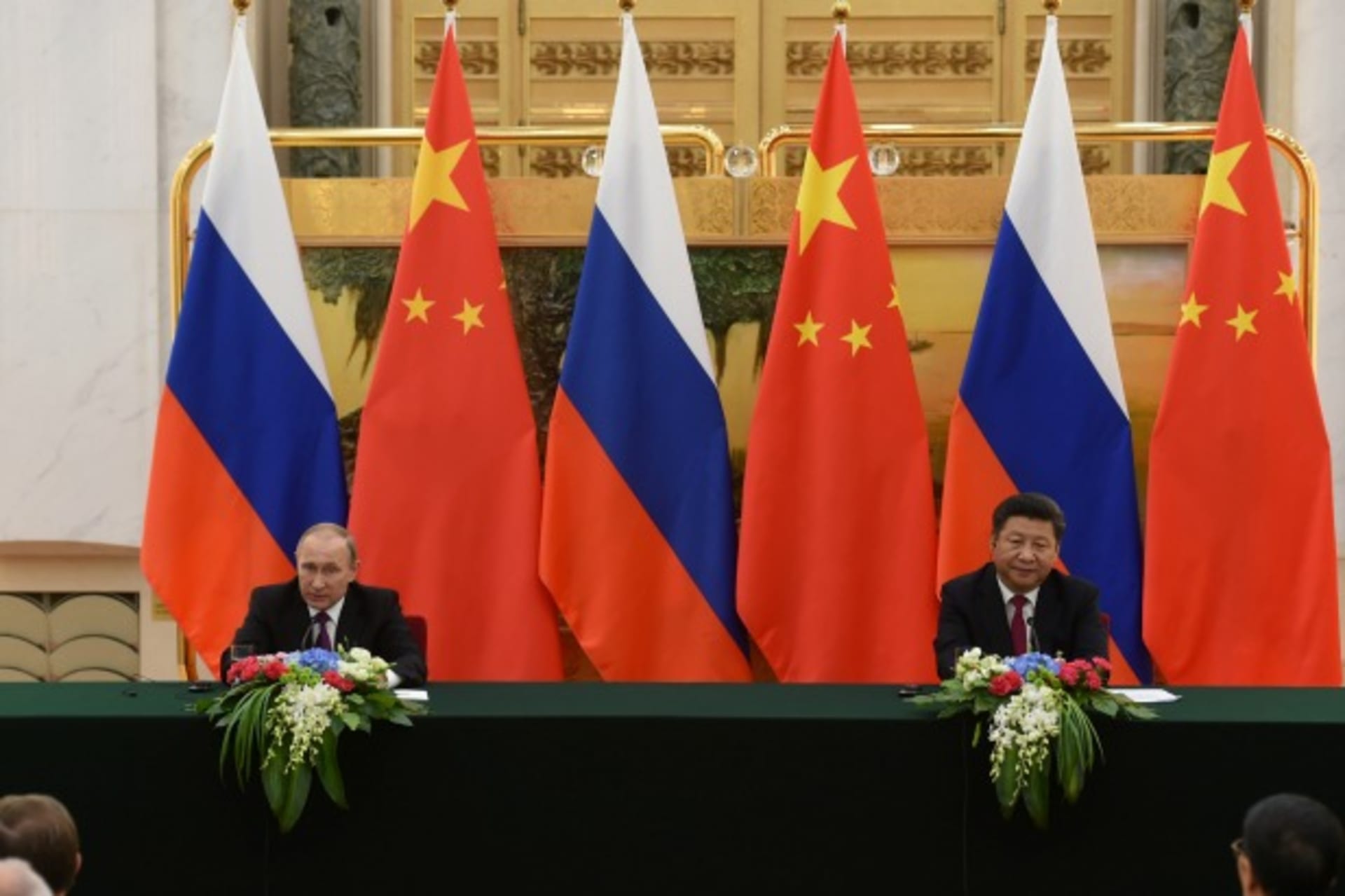 <p>Despite attempts to signal a close relationship, Russia and China remain pretty far apart from each other. (Greg Baker/Reuters)</p>
