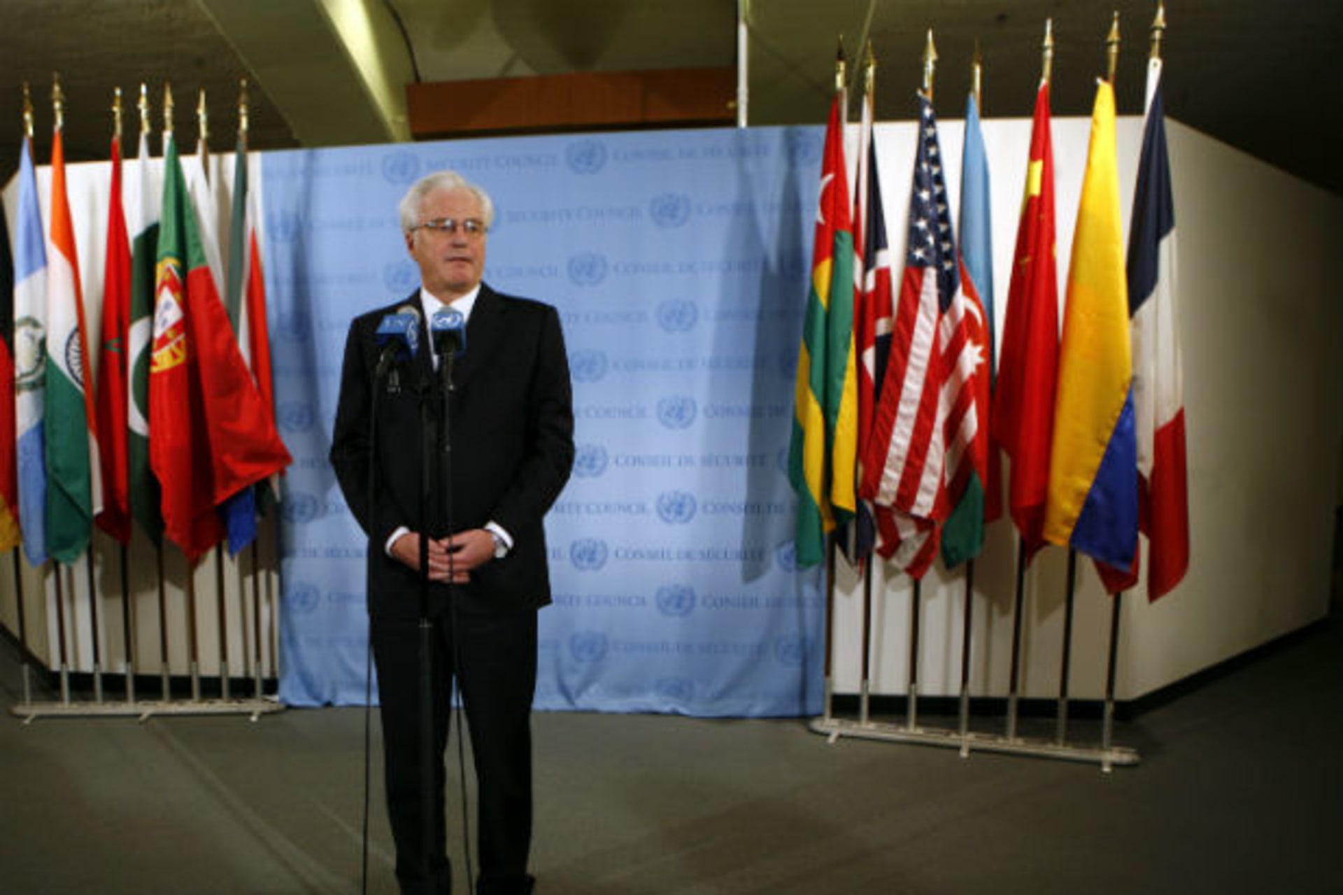 Russian ambassador to the United Nations Vitaly Churkin speaks to media after a UN Security Council meeting to discuss a European-Arab draft resolution endorsing an Arab League plan calling for Syrian president Bashar al-Assad to give up power