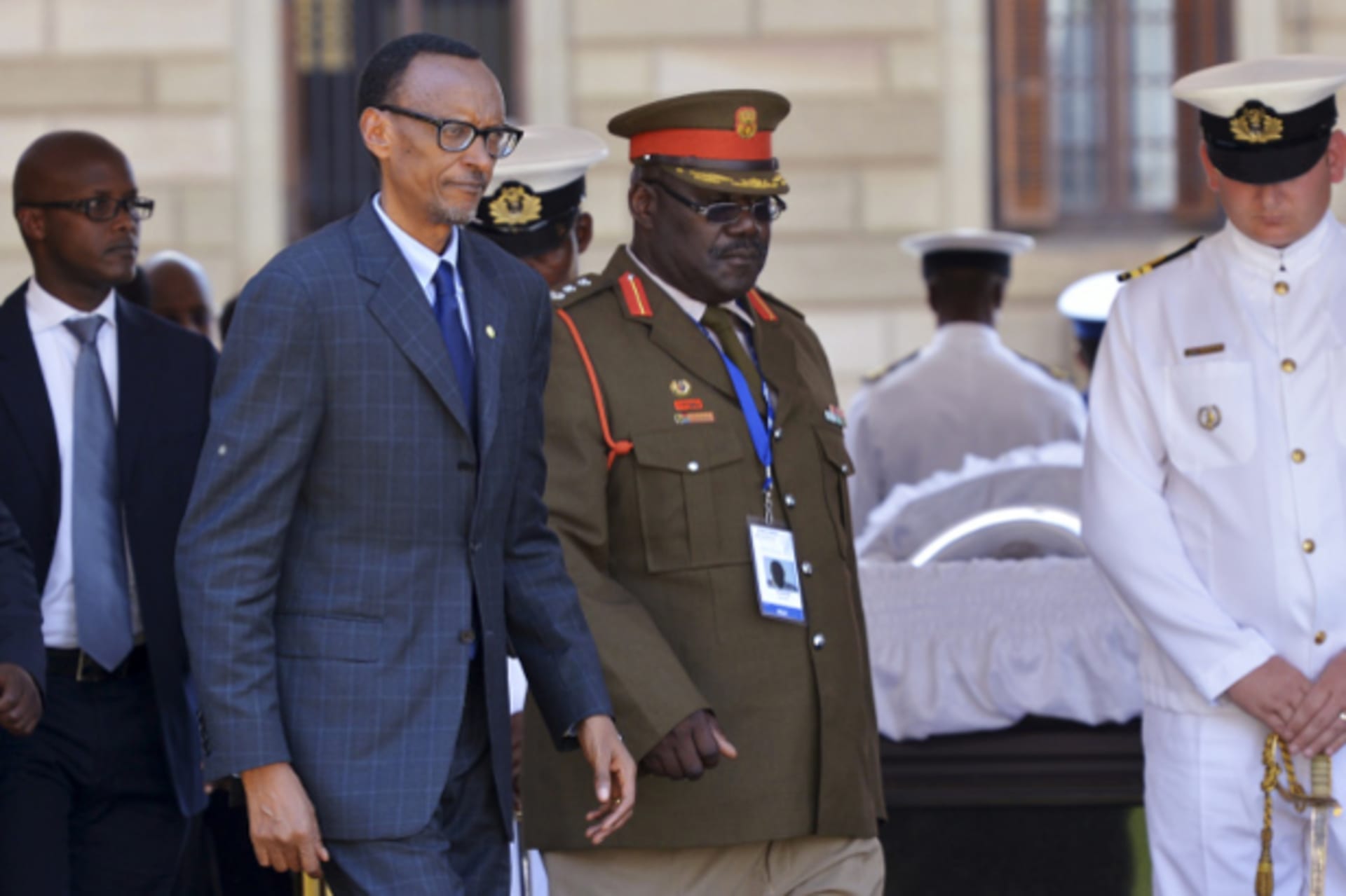 Rwanda's President Paul Kagame (2nd L) pays his respects to former South African President Nelson Mandela on the last day of Mandela's lying in state at the Union Buildings in Pretoria December 13, 2013.