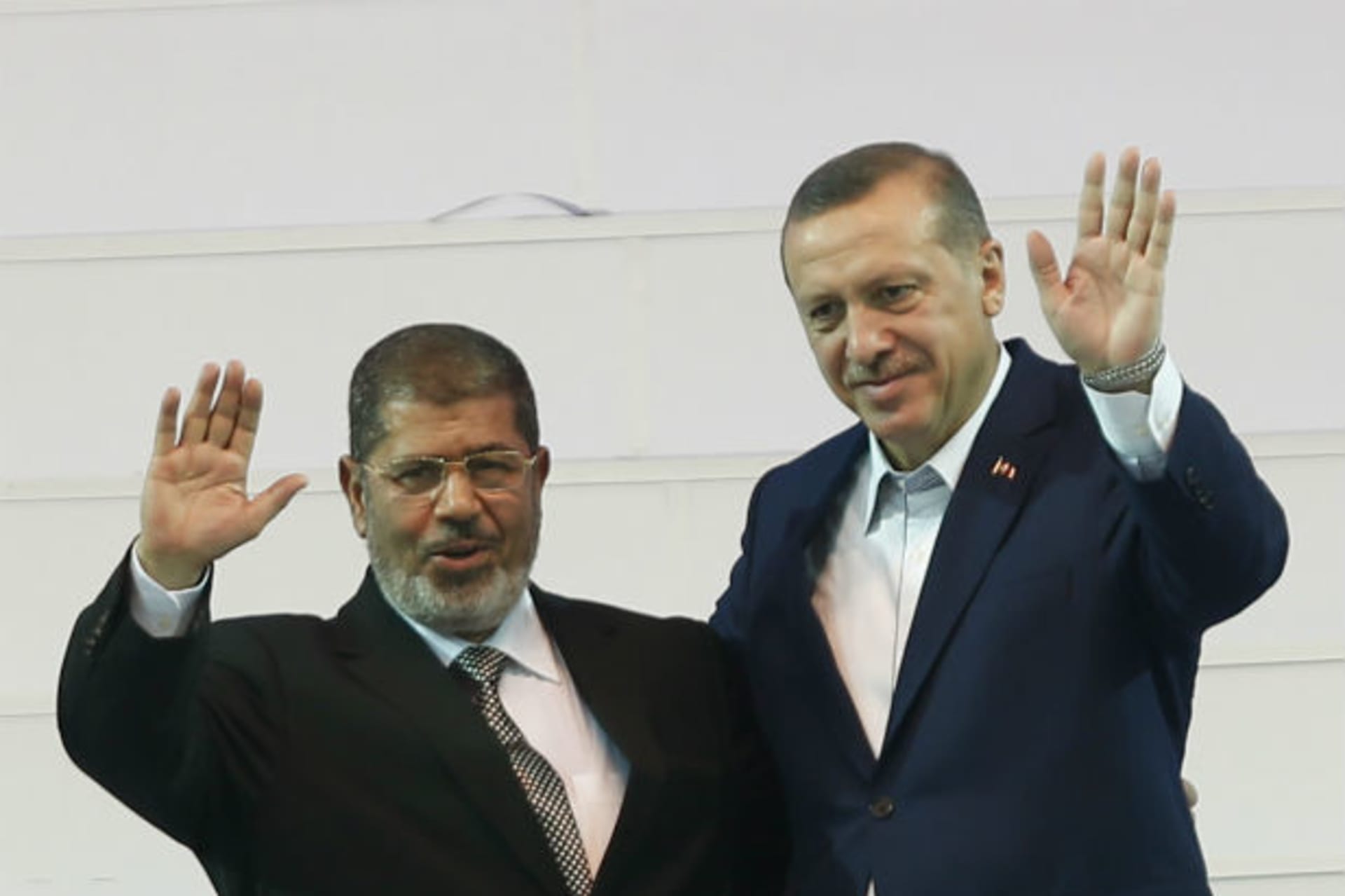 <p>Prime Minister Recep Tayyip Erdogan (R) hosts ousted Egyptian President Mohammed Morsi (L) in Ankara on September 30, 2012.</p>
