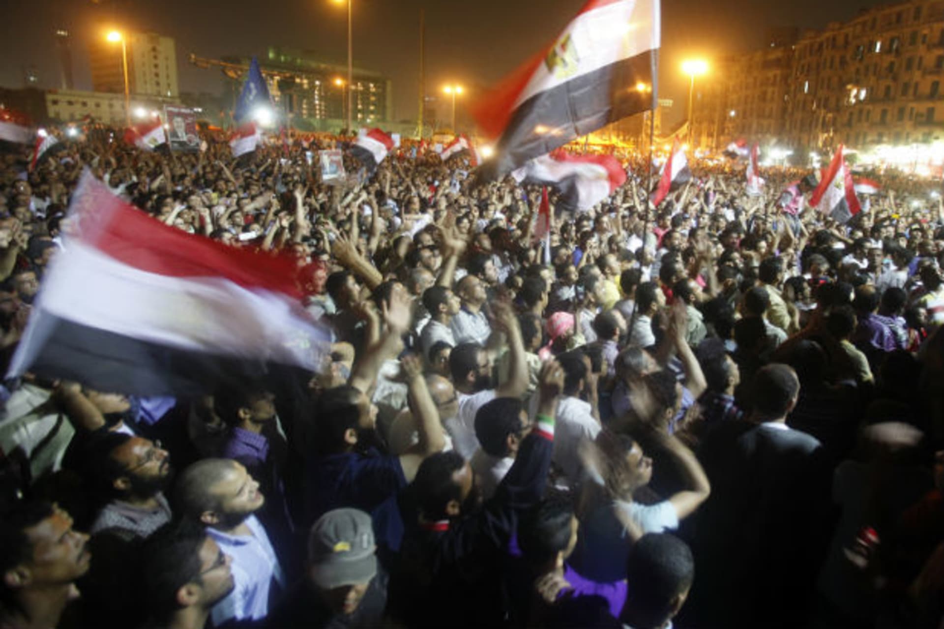 Protesters chant slogans against the military council at Tahrir Square in Cairo on June 20, 2012 (Asmaa Waguih/Courtesy Reuters).