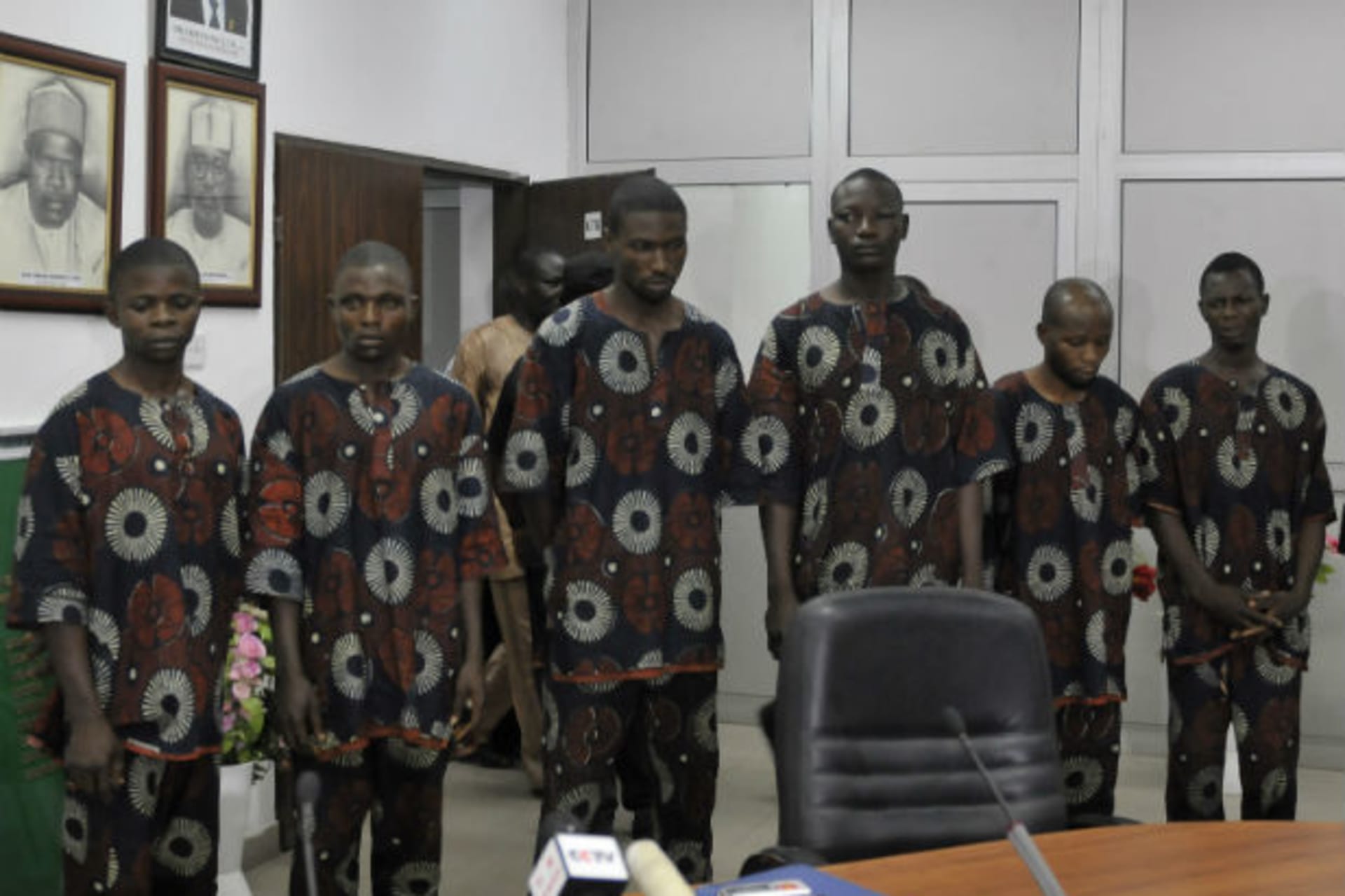 Members of a criminal gang that kidnapped a United Arab Emirate national Mohammed Khamis al Ali, are paraded by the state security service (SSS) in Nigeria's capital Abuja March 29, 2012.
