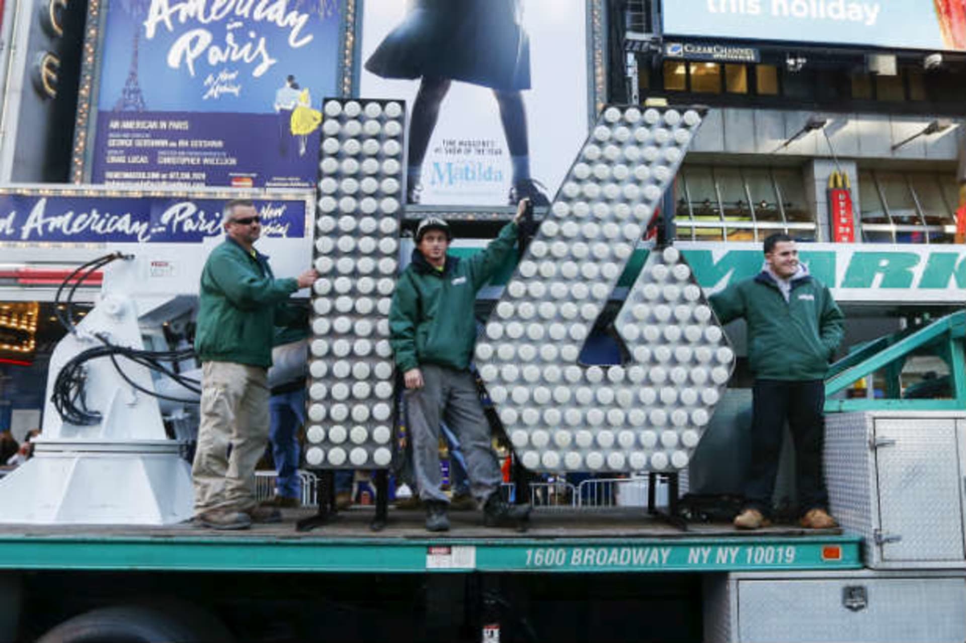 <p>The New Year’s Eve “16” numerals arrive on a truck in Times Square New York. (Shannon Stapleton/Courtesy Reuters)</p>
