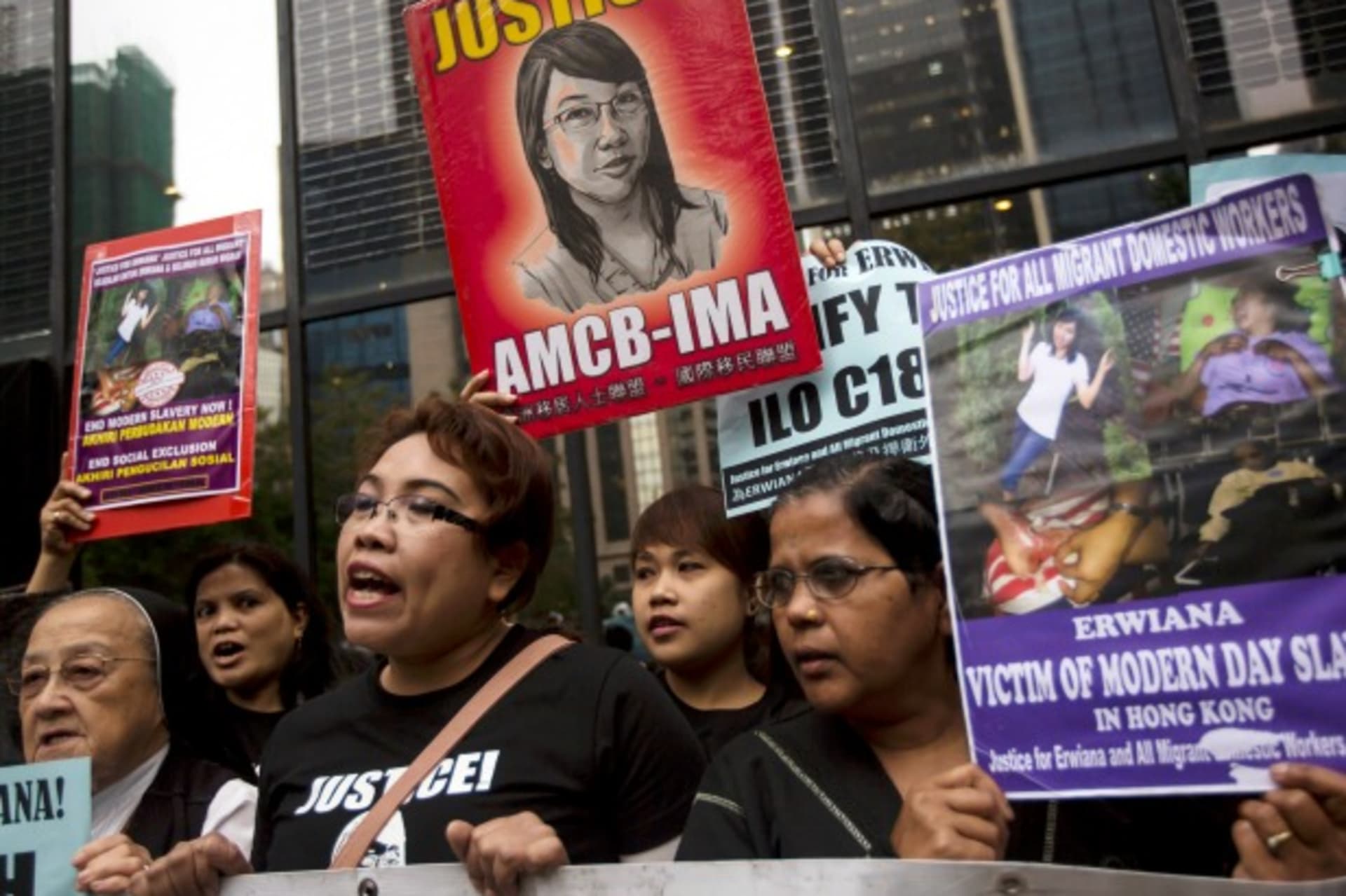 <p>Supporters hold signs of Indonesian domestic helper Erwiana Sulistyaningsih, during a protest calling for better protection of…Indonesia. She is due to be sentenced on Friday. REUTERS/Tyrone Siu (CHINA – Tags: CRIME LAW BUSINESS EMPLOYMENT CIVIL UNREST)</p>
