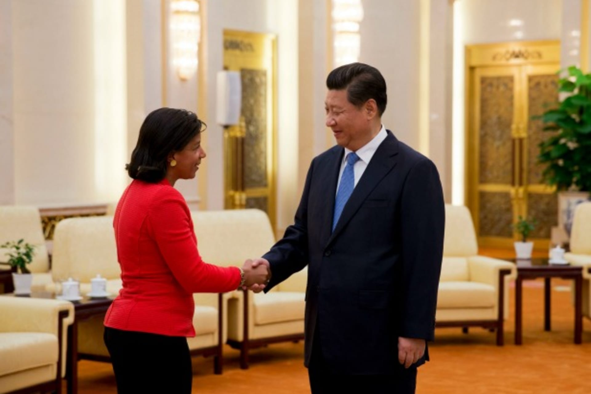 <p>U.S. National Security Advisor Susan Rice (L), shakes hands with Chinese President Xi Jinping during a meeting at the Great Hall of the People, in Beijing September 9, 2014. REUTERS/Andy Wong/Pool (CHINA – Tags: POLITICS MILITARY)</p>

