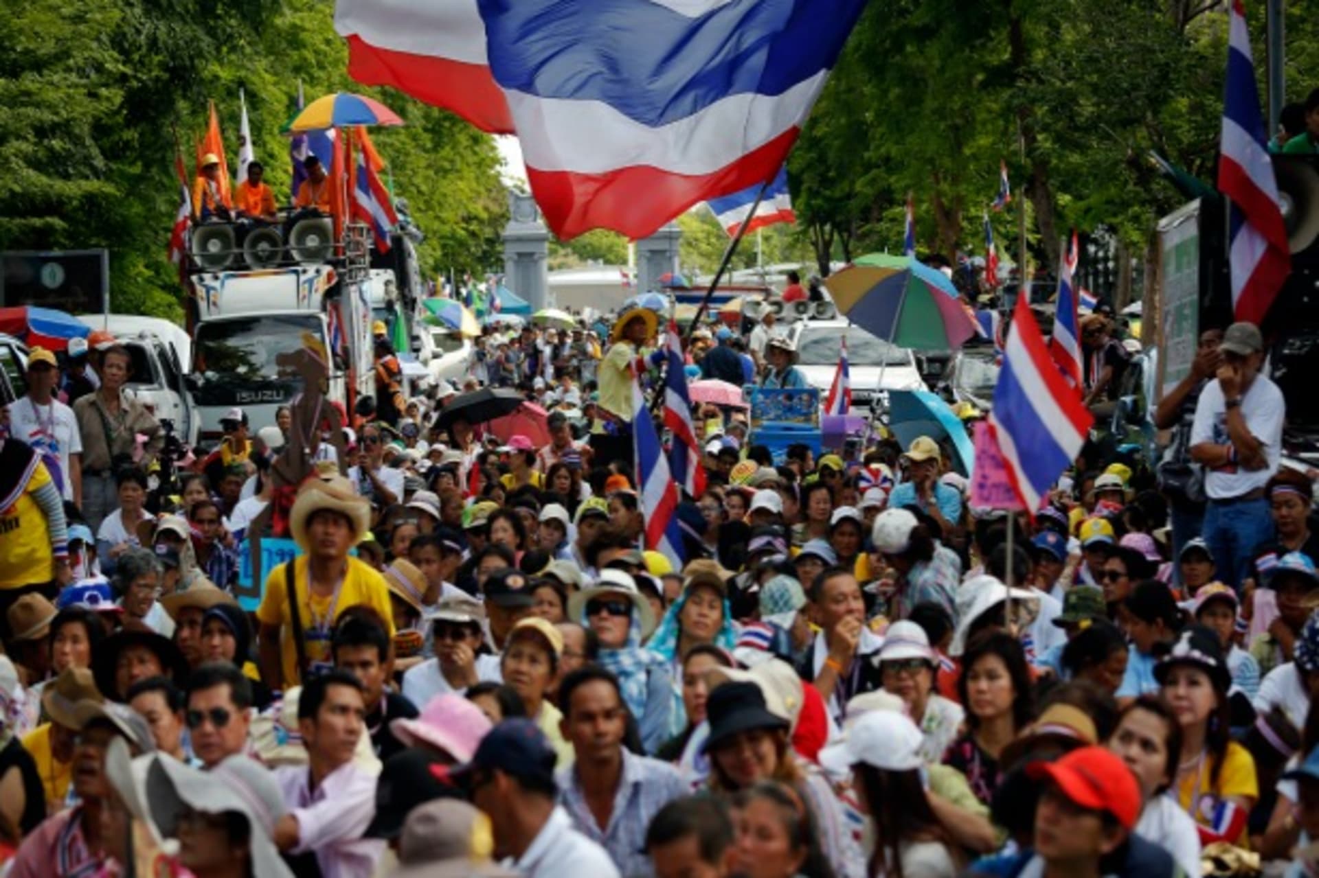 <p>Anti-government protesters wait for their leader Suthep Thaugsuban to come out from the parliament building to address them in…ister Yingluck Shinawatra out of office and an anti-graft agency indicted her for negligence (Damir Sagolj/Courtesy: Reuters).</p>

