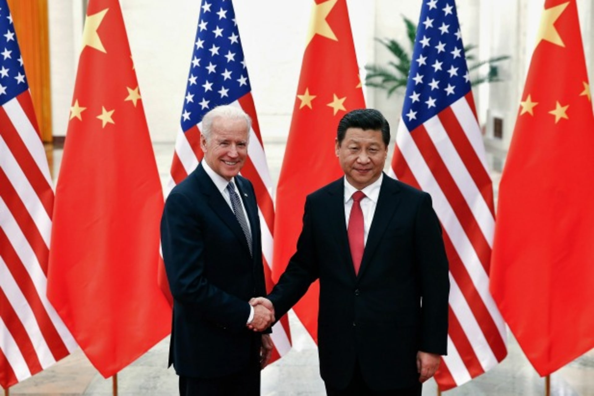 <p>Chinese President Xi Jinping shakes hands with U.S. Vice President Joe Biden (L) inside the Great Hall of the People in Beijing on December 4, 2013. (Lintao Zhang/Courtesy Reuters)</p>
