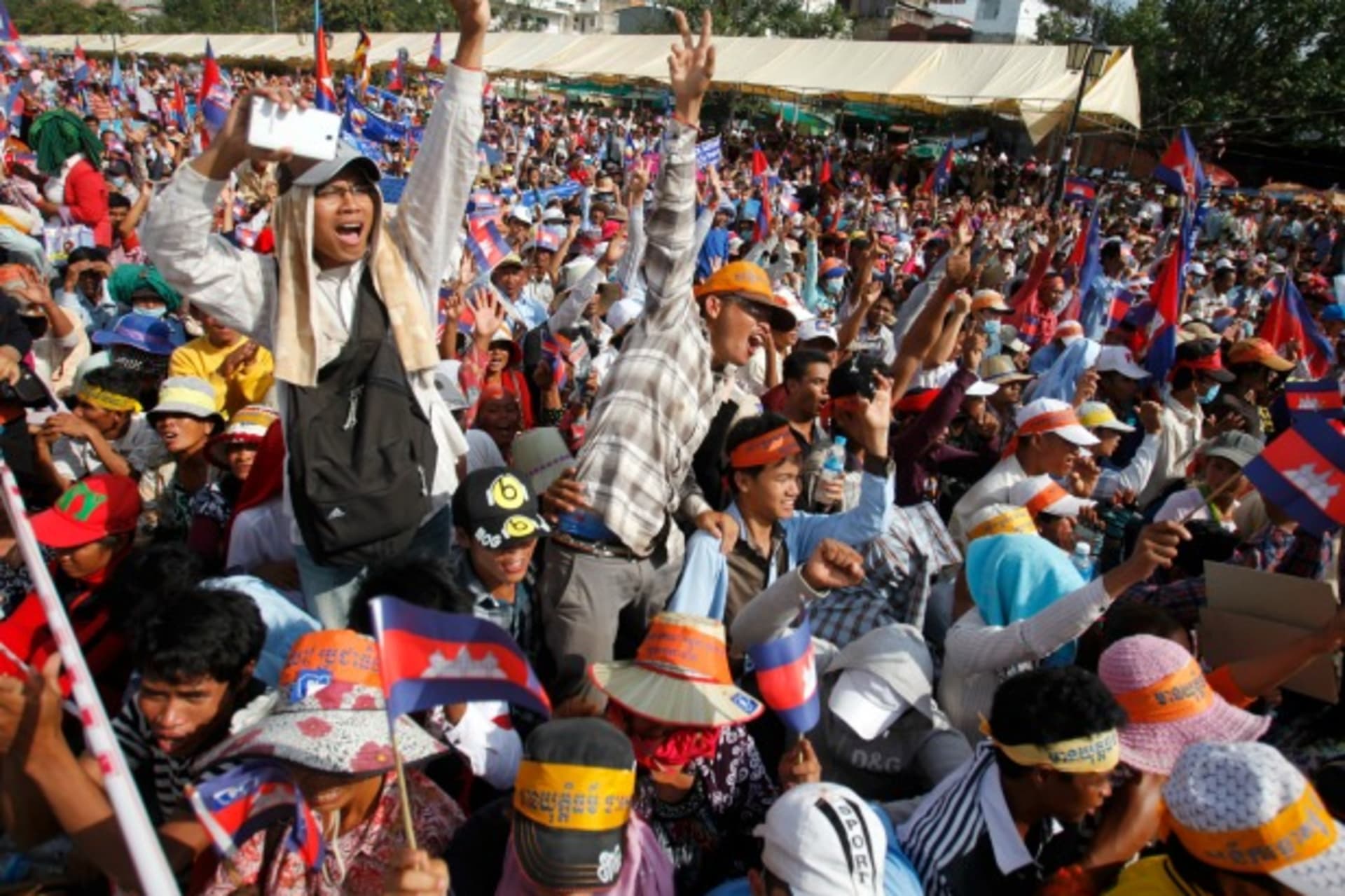 <p>Supporters of the opposition Cambodia National Rescue Party (CNRP) gather during a protest at the Freedom Park in central Phnom Penh on October 23, 2013 (Samrang Pring/Courtesy Reuters).</p>
