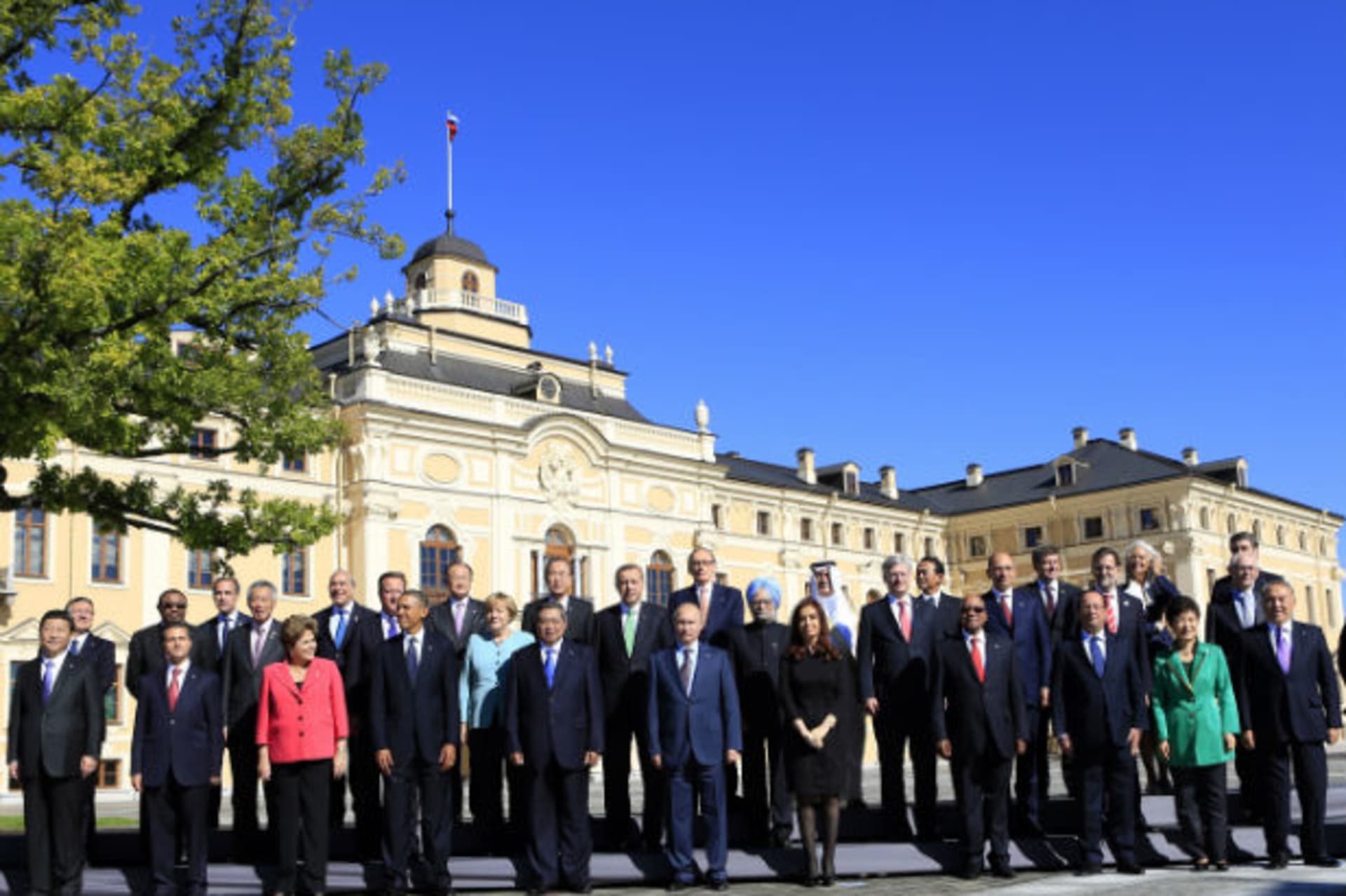 <p>Leaders pose for a group photo at Constantine Palace during the G20 Summit in St. Petersburg (Kevin Lamarque/Courtesy Reuters)</p>
