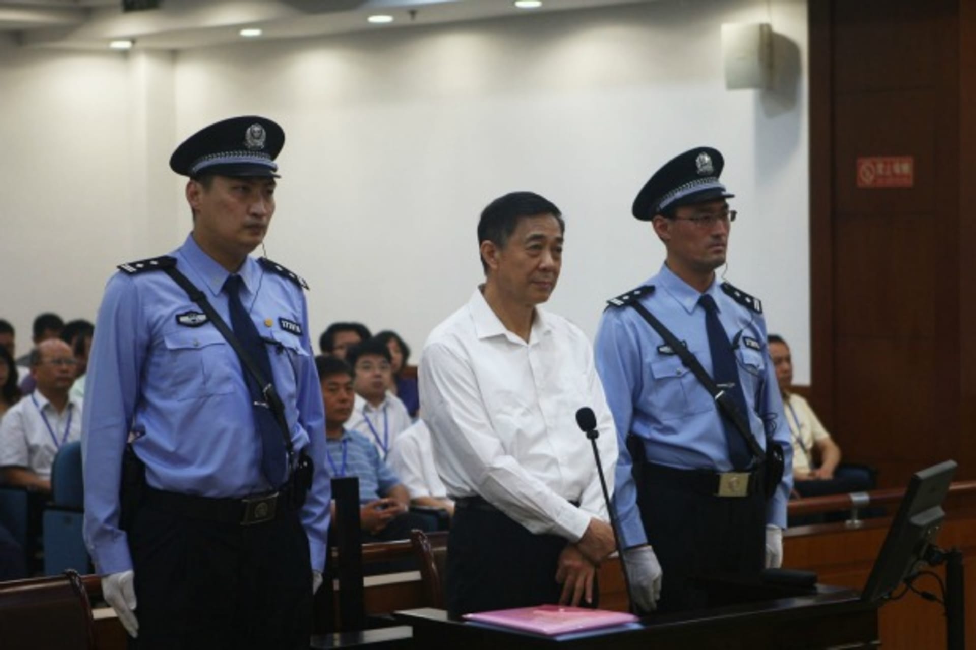 <p>Disgraced Chinese politician Bo Xilai stands trial inside the court in Jinan, Shandong province, on August 22, 2013. (Jinan Intermediate People’s Court/Courtesy Reuters)</p>
