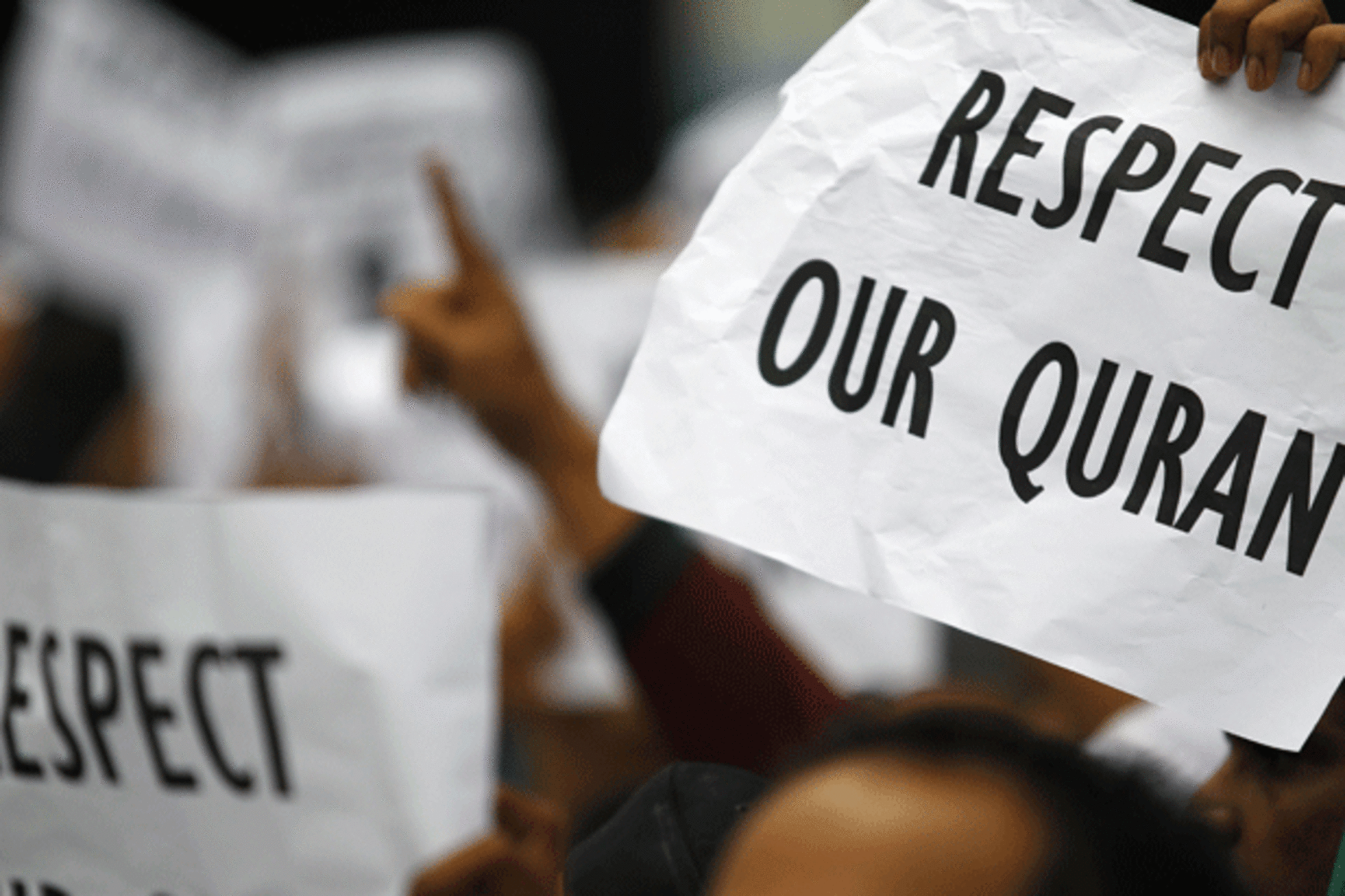 <p>Demonstrators protest a Koran-burning incident in Afghanistan outside the U.S. embassy in Kuala Lumpur on February 24, 2012. (Bazuki Muhammad/courtesy Reuters)</p>
