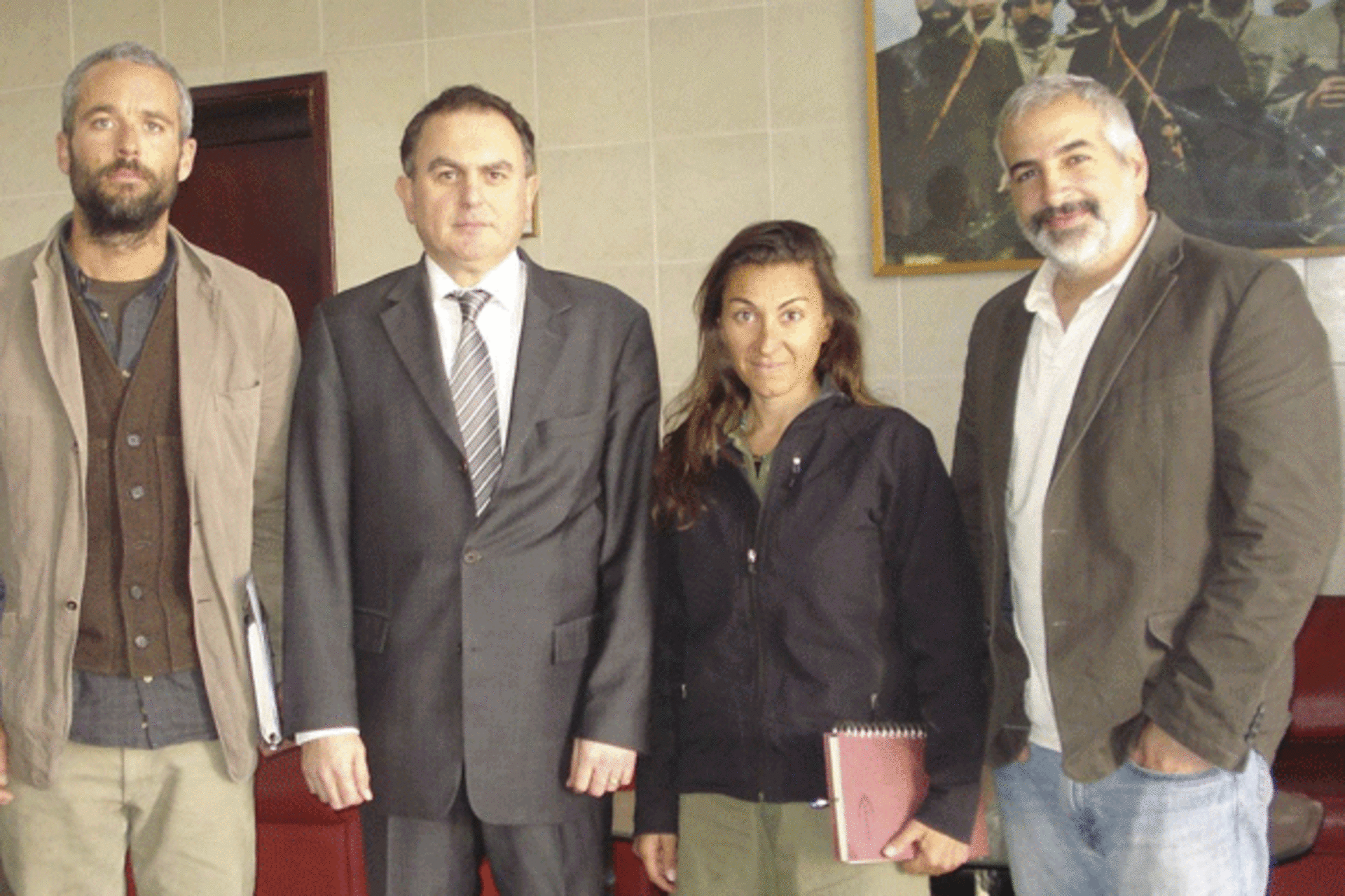 <p>Anthony Shadid (right) with other New York Times journalists and Turkey’s Ambassador to Libya on March 21, 2011. (Handout/courtesy Reuters)</p>

