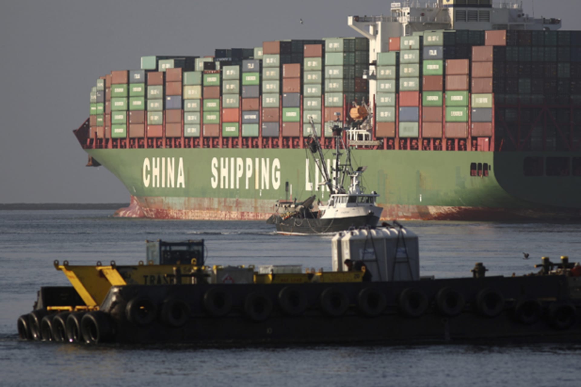 The Xin Mei Zhou container ship is seen at the Port of Los Angeles in Los Angeles