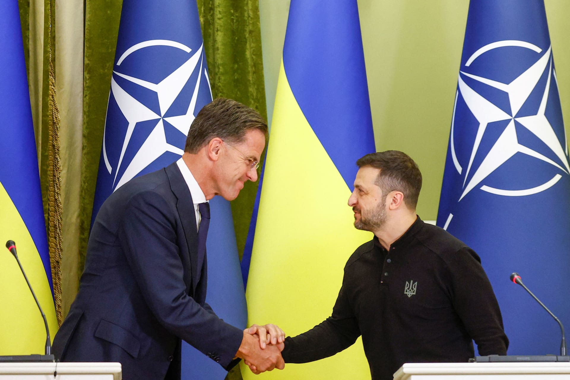 <p>Ukrainian President Volodymyr Zelenskyy and NATO Secretary General Mark Rutte shake hands during a press conference in Kyiv, Ukraine.</p>
