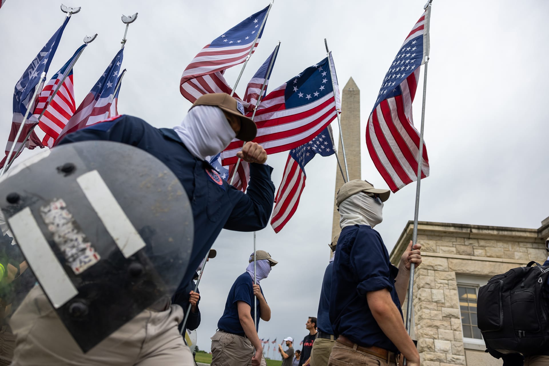 <p>Members of the far-right group Patriot Front march through Washington, DC, on May 13, 2023.</p>
