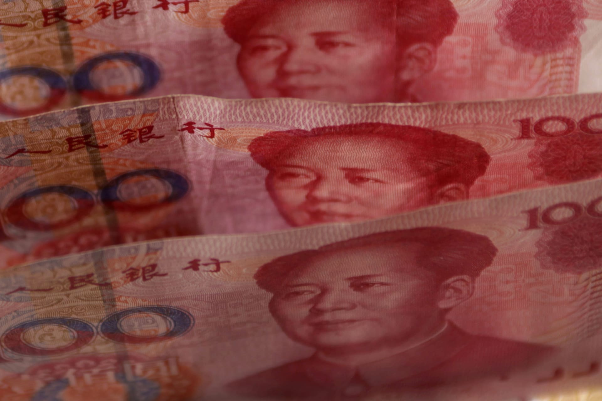 <p>Yuan banknotes are seen in this illustrative photograph taken in Beijing on September 19, 2010.</p>