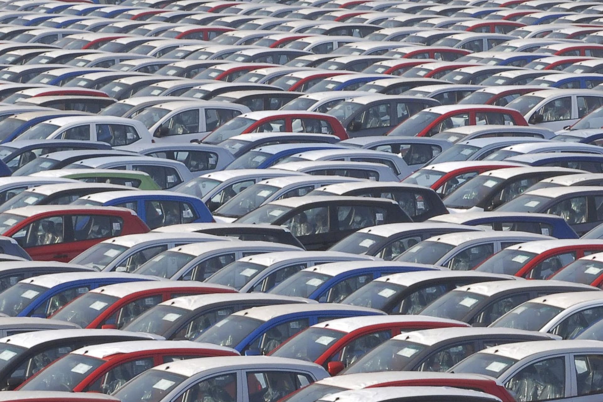 <p>Parked Hyundai cars ready for shipment at a port in the southern Indian city of Chennai on January 24, 2010.</p>
