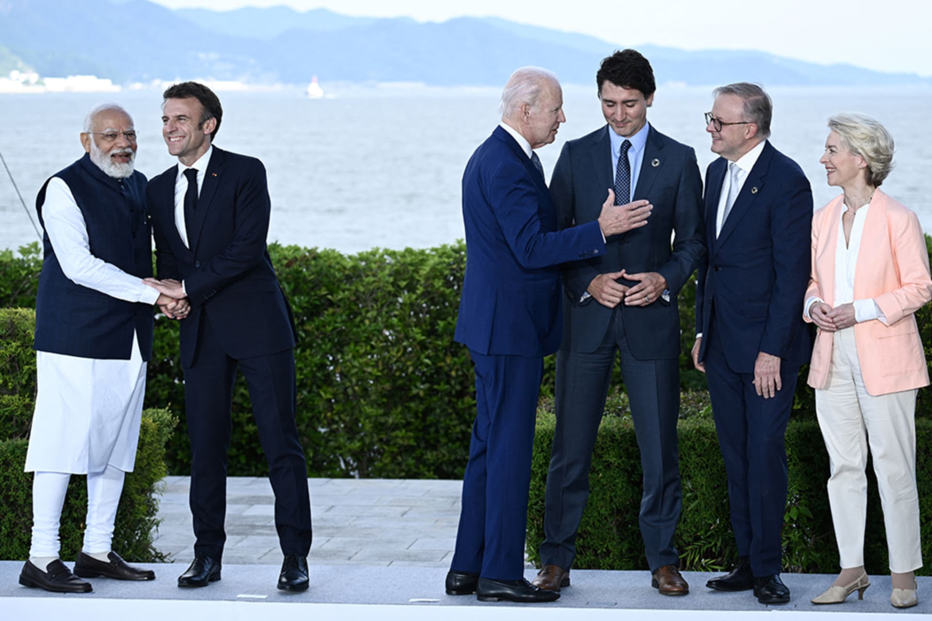 <p>Indian Prime Minister Modi speaks with French President Macron as U.S. President Biden speaks with Canadian Prime Minister Trudeau, Australian Prime Minister Albanese, and European Commission President von der Leyen.</p>
