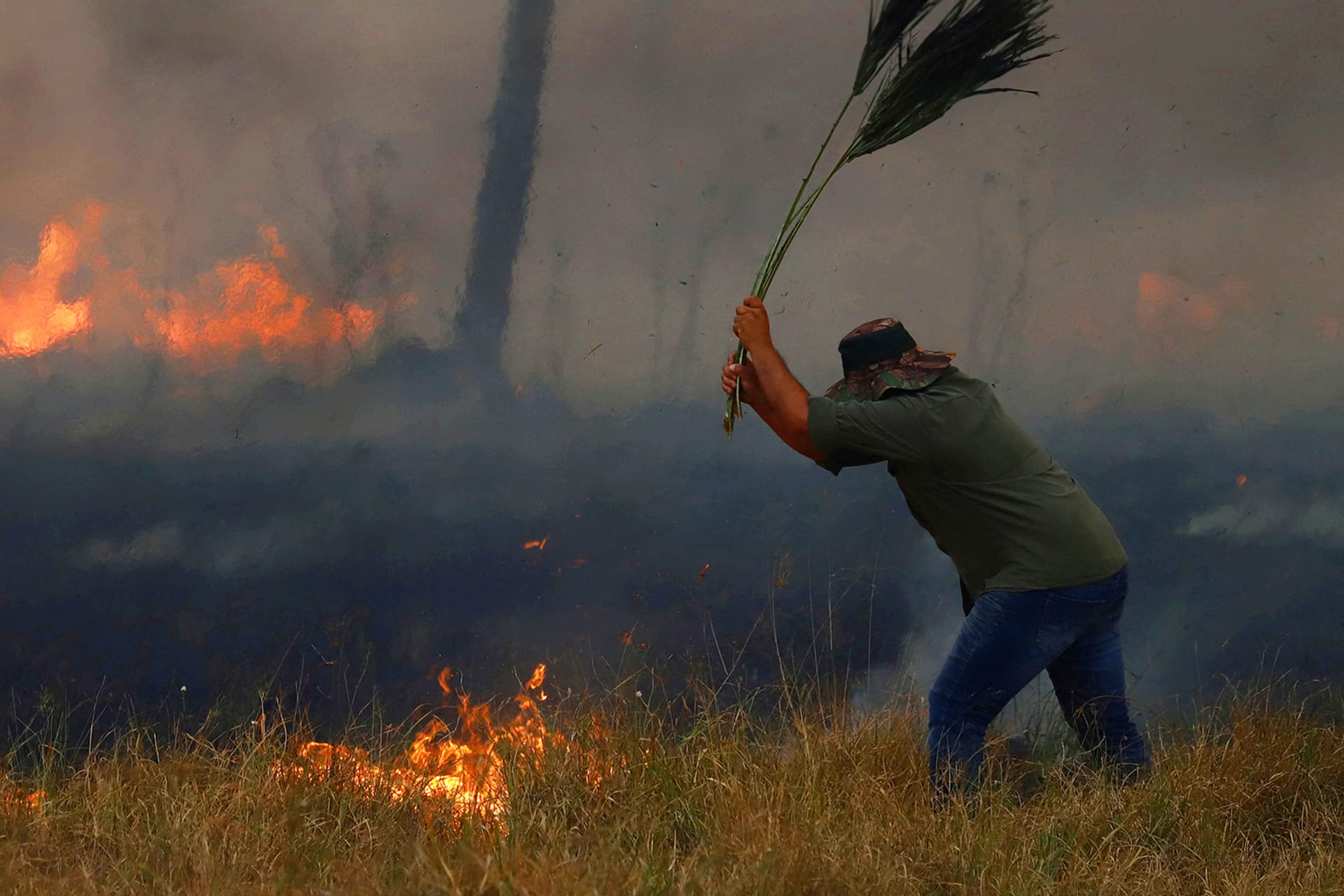 <p>A fire burns on a pasture in San Luis del Palmar, Argentina, on February 19, 2022.</p>

