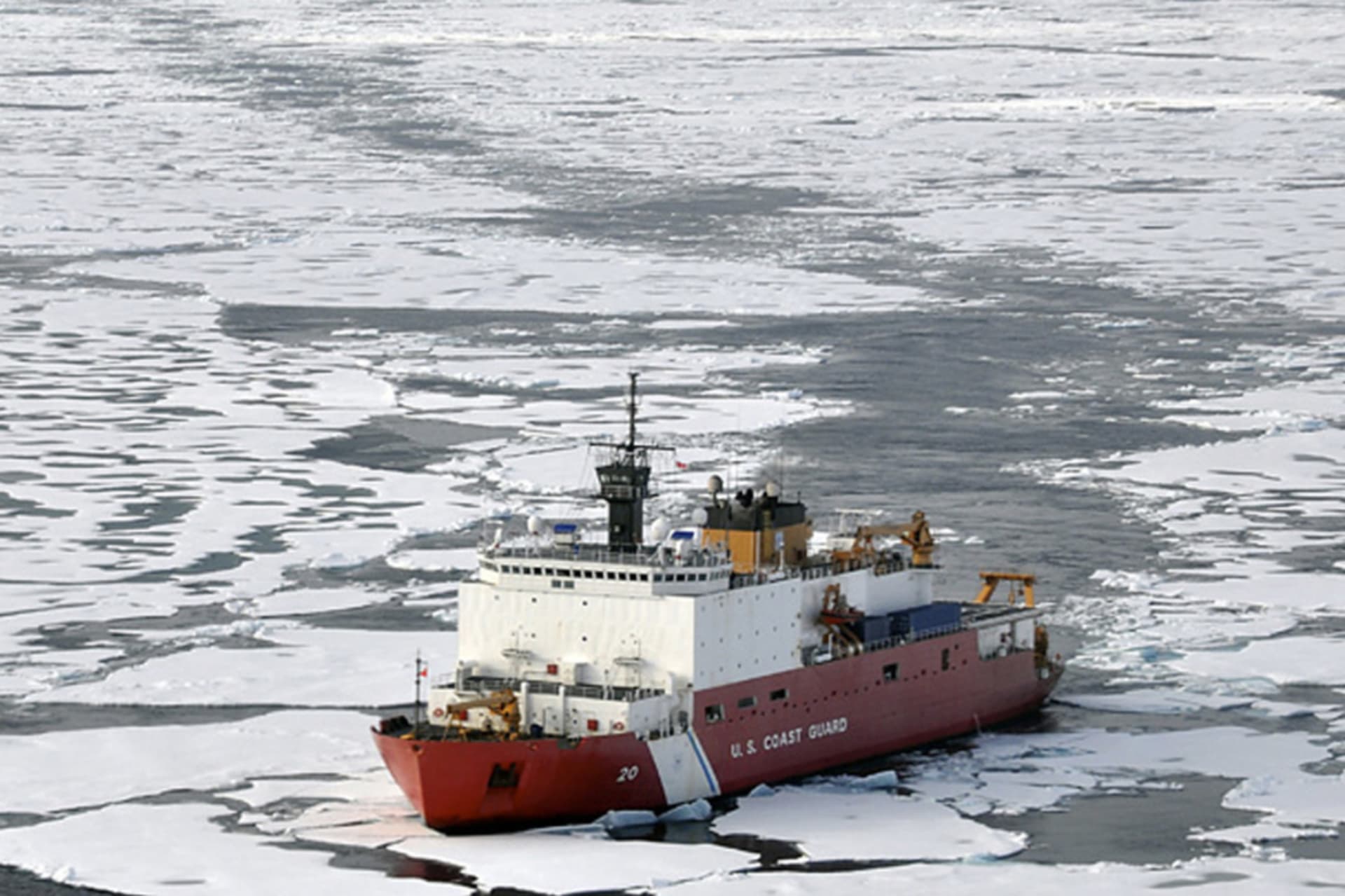 <p>The Coast Guard Cutter Healy breaks ice ahead of the Canadian Coast Guard Ship Louis S. St-Laurent during an Arctic expedition, in this August 24, 2009 handout photo.</p>
