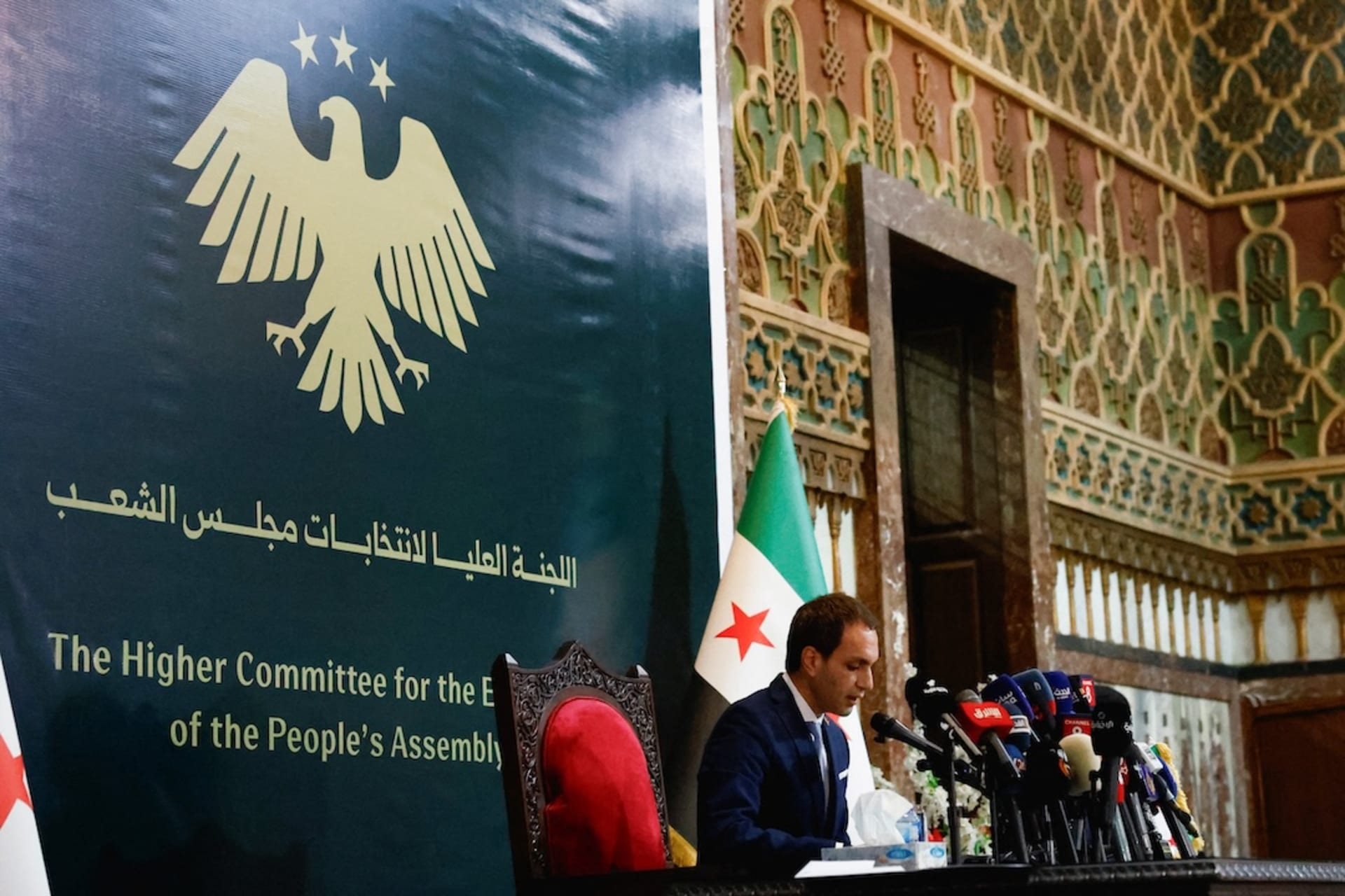 <p>Nawar Najma, spokesperson of the Syria’s Higher Committee for People’s Assembly Elections, announces the results of the Syrian parliamentary elections, in Damascus, Syria, October 6, 2025.</p>
