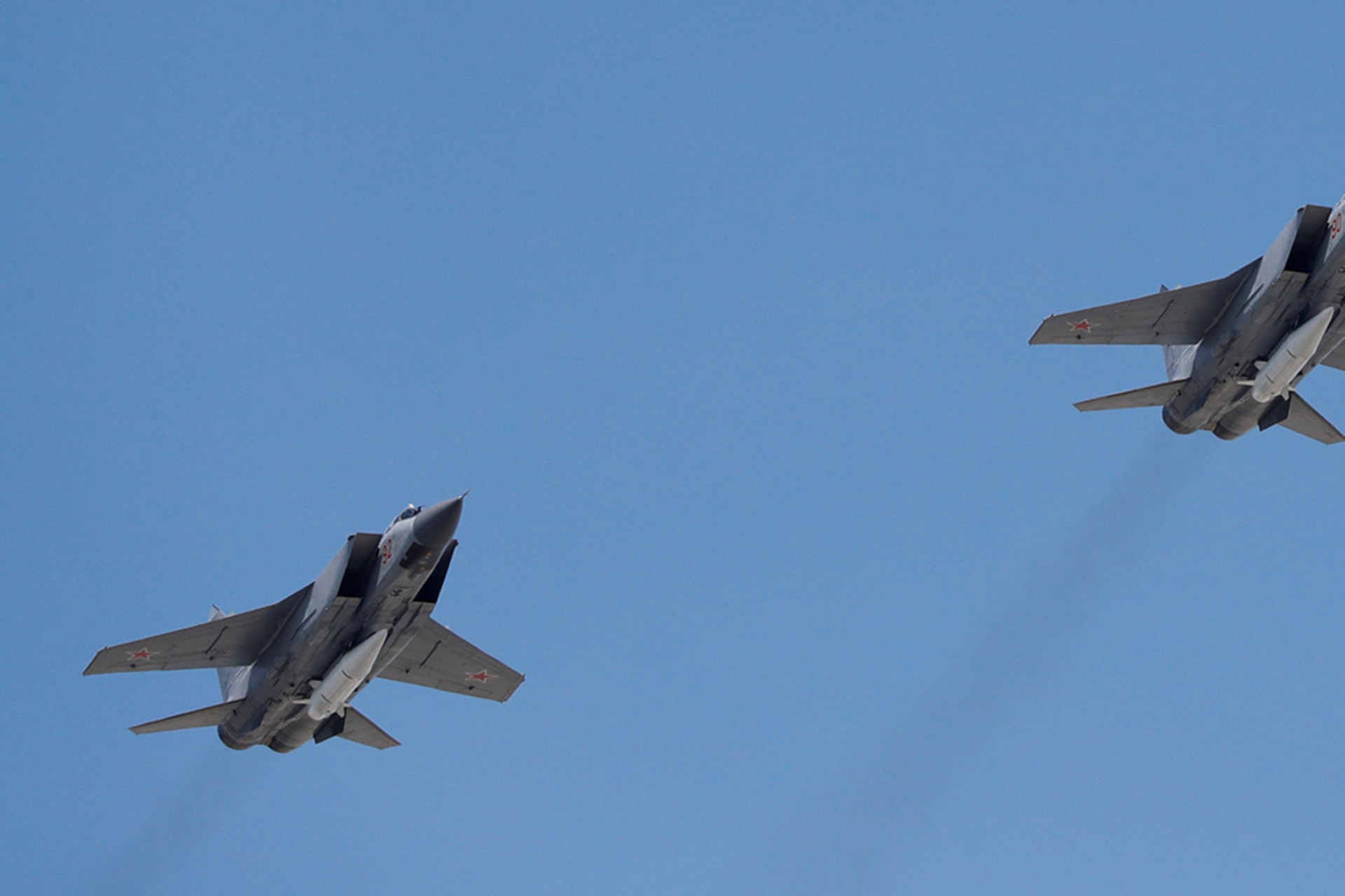 <p>Russian Air Force MiG-31 fighter jets fly in formation during the Victory Day parade, marking the 73rd anniversary of the victory over Nazi Germany in World War Two, above Red Square in Moscow, Russia, on May 9, 2018.</p>
