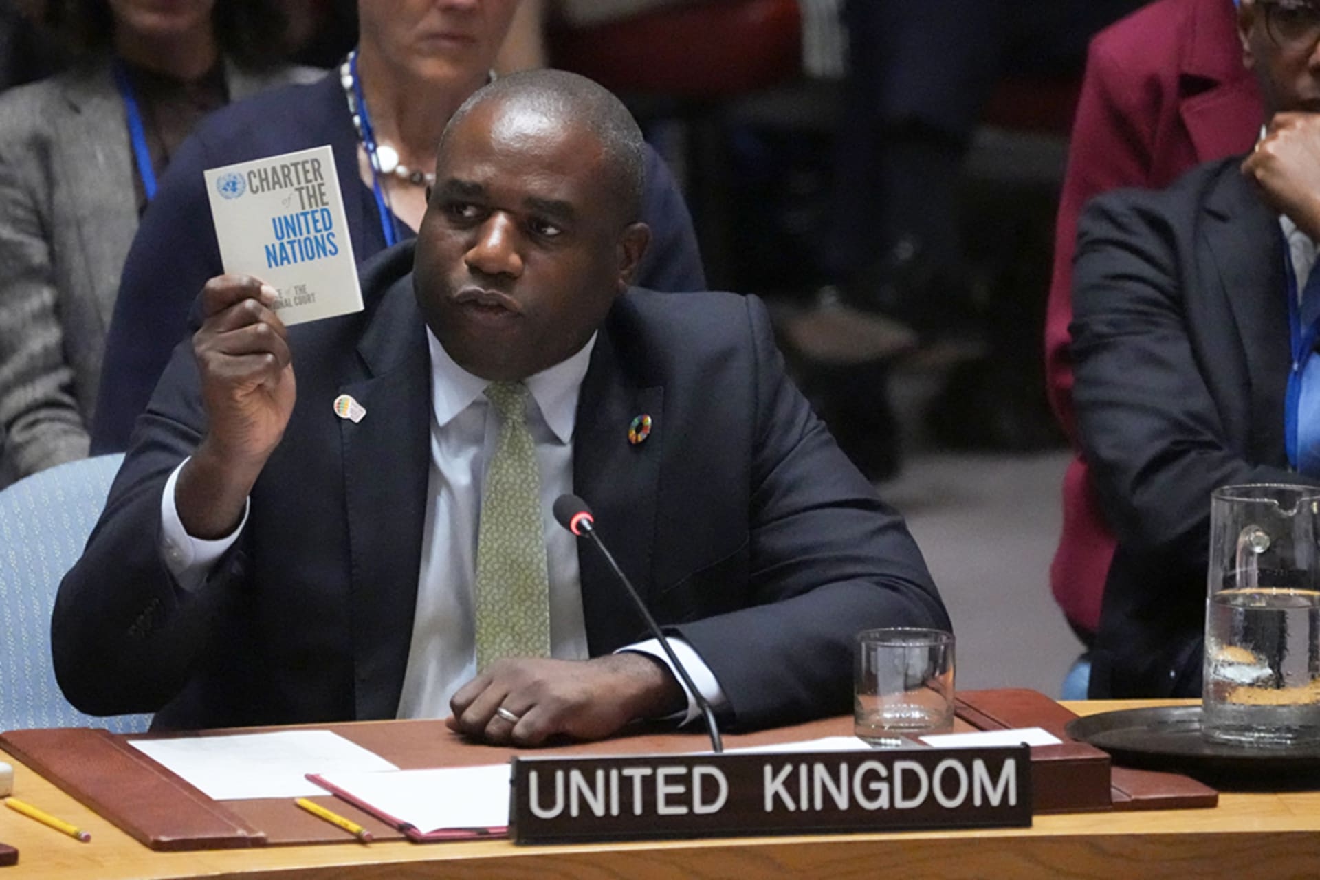 <p>British Foreign Secretary David Lammy holds up a copy of the UN Charter as he speaks during a UN Security Council meeting on the conflict between Ukraine and Russia at the United Nations headquarters in New York City on September 24, 2024.</p>
