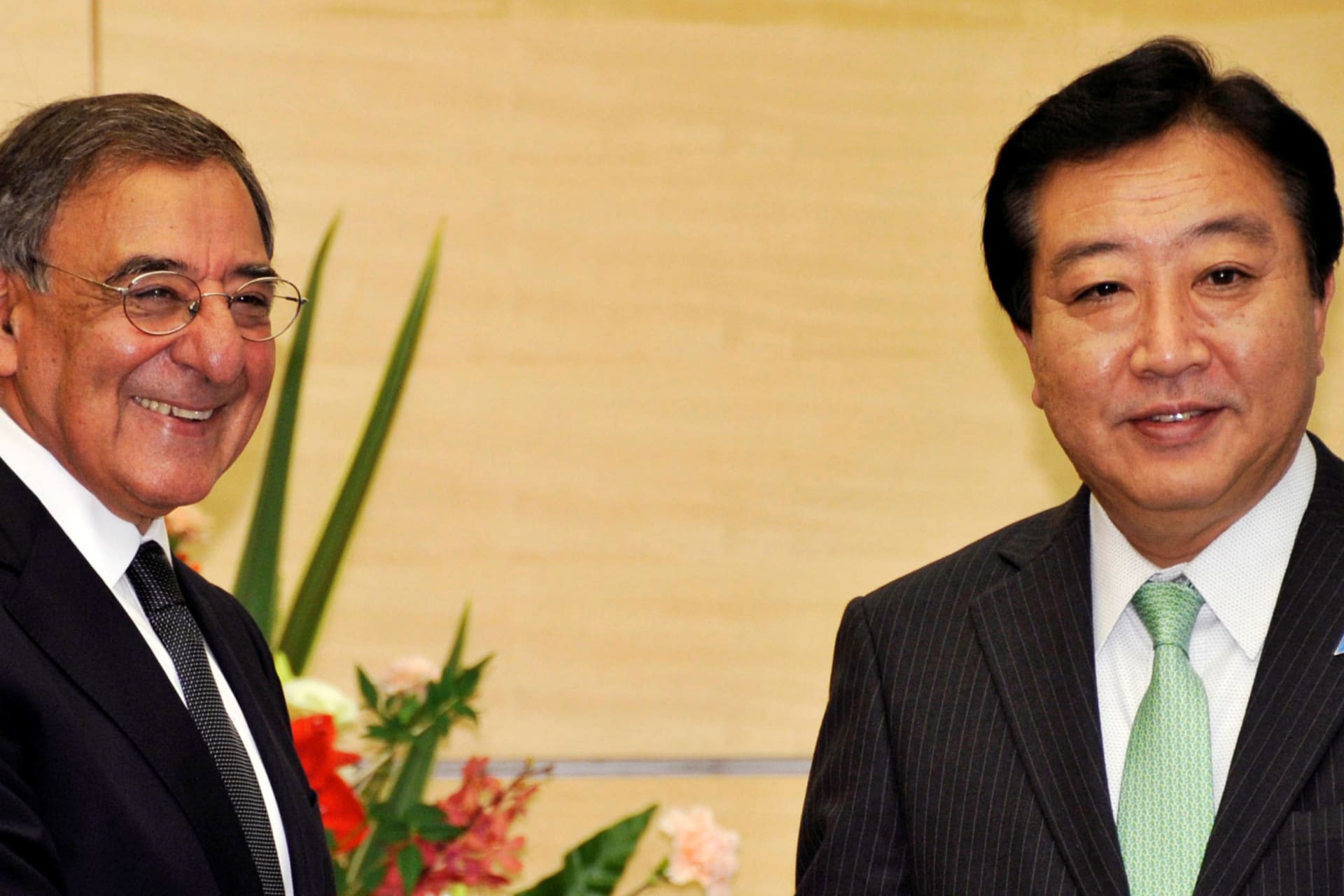<p>U.S. Secretary of Defense Leon Panetta (L) shakes hands with Japanese Prime Minister Yoshihiko Noda before their talks in Tokyo on October 25, 2011.</p>
