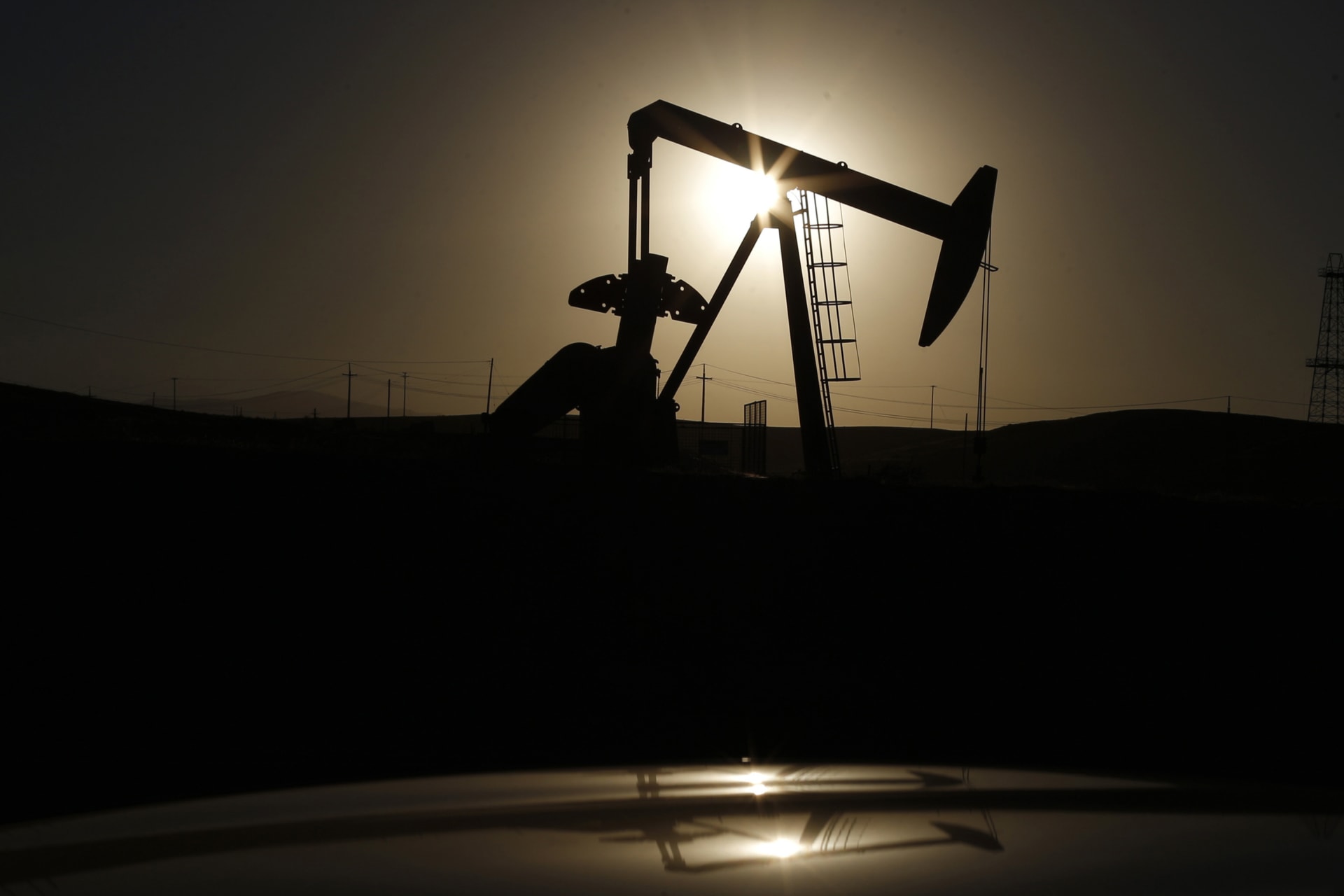 <p>A pump jack is seen at sunrise near Bakersfield, California, on October 14, 2014.</p>
