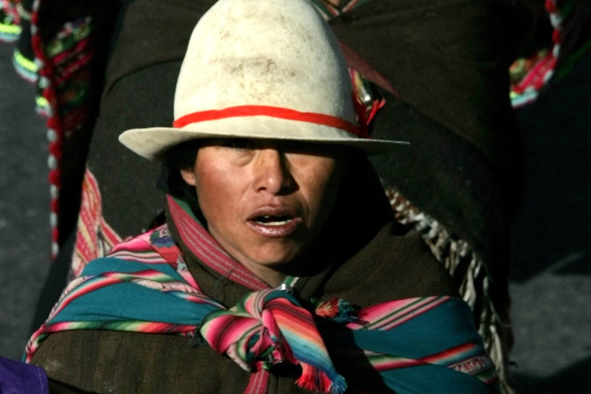 <p>A Bolivian Indian woman shouts slogans during a march in the city of El Alto 15Km (10 Miles) south of La Paz, Bolivia May 23, 2005.</p>