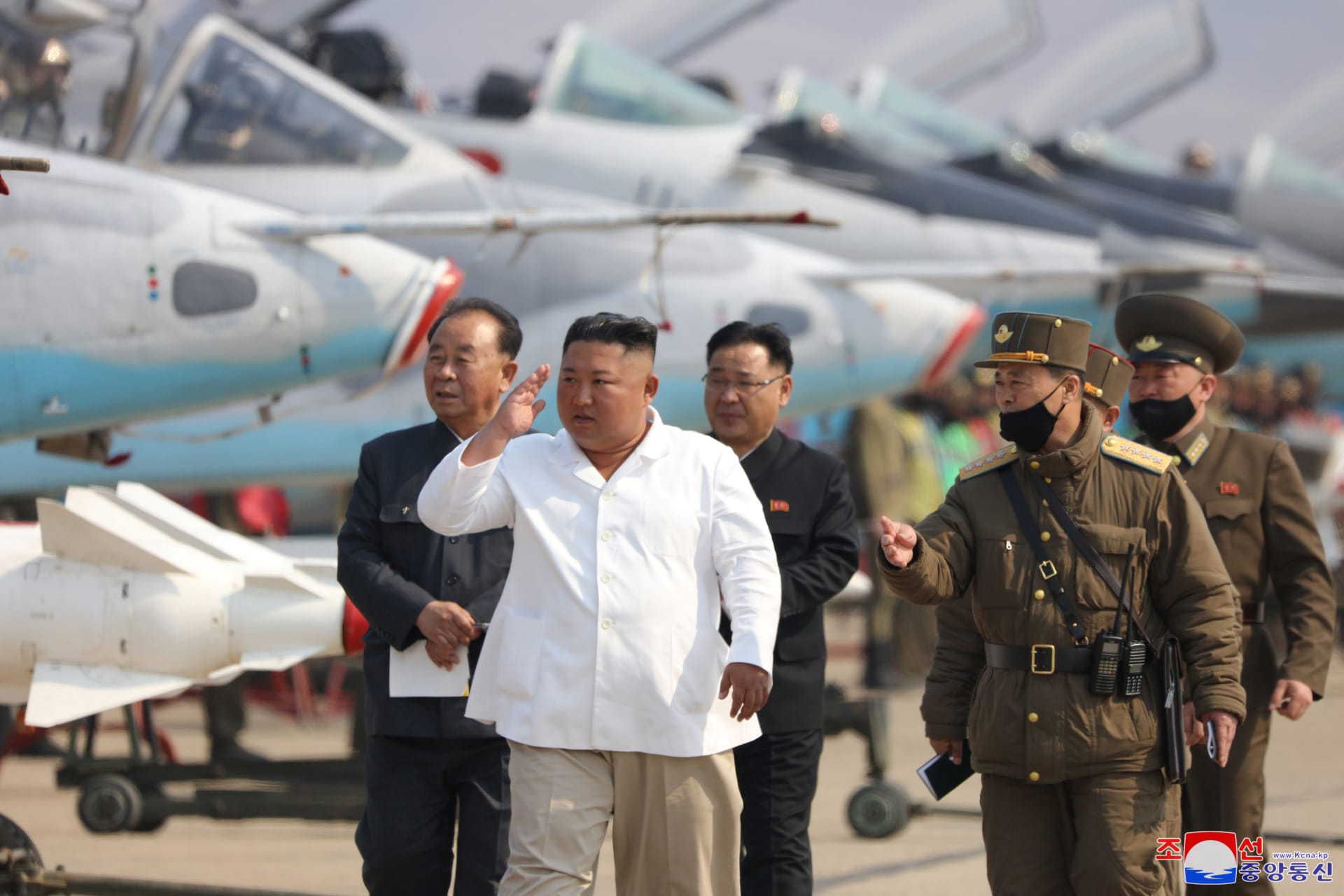 <p>North Korean leader Kim Jong-un visits a pursuit assault plane group under the Air and Anti-Aircraft Division in western North Korea on an unknown date. </p>
