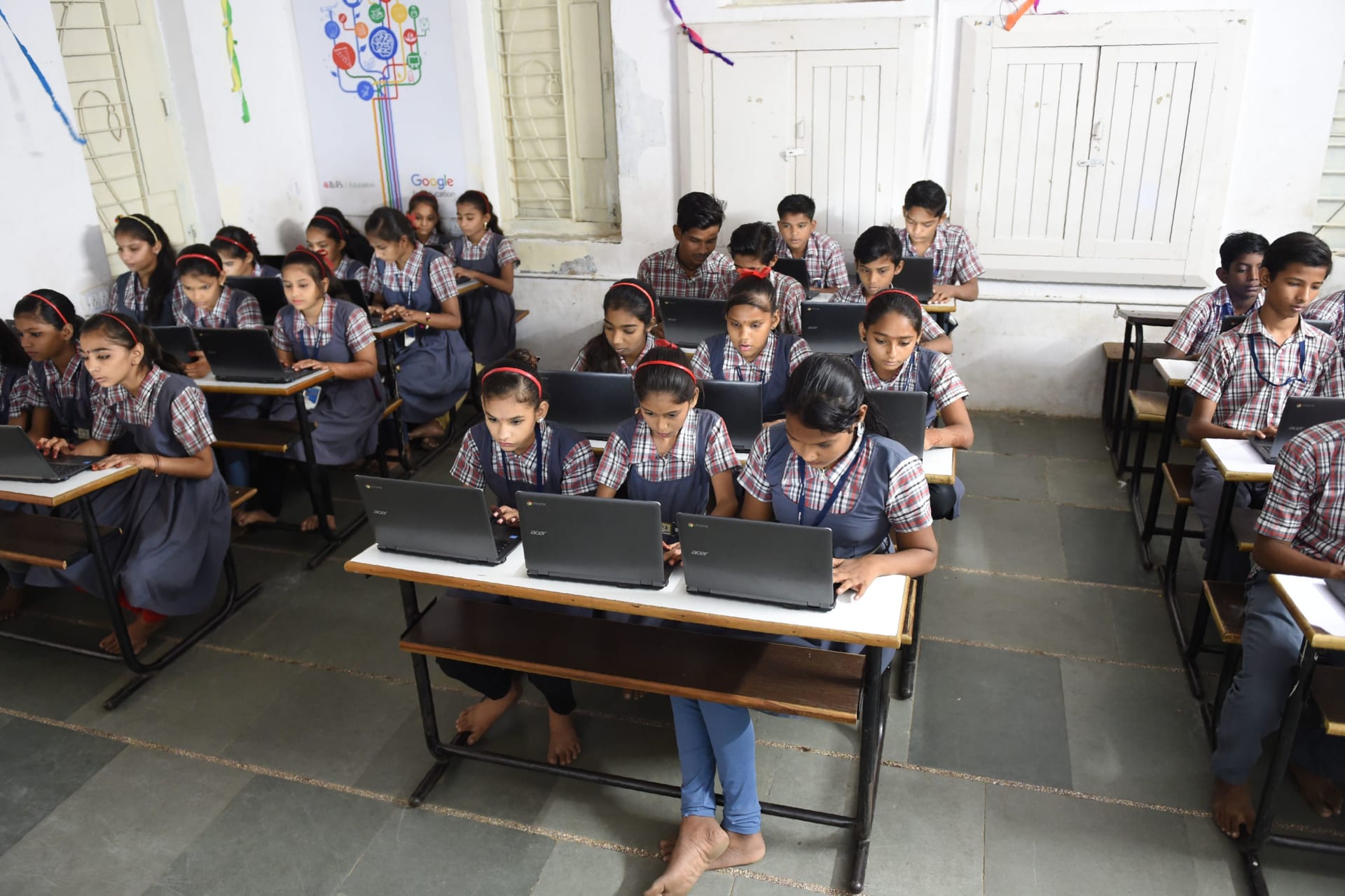 <p>Students at a government school work on individual laptops, in Ahmedabad, India, on July 26, 2018. </p>
