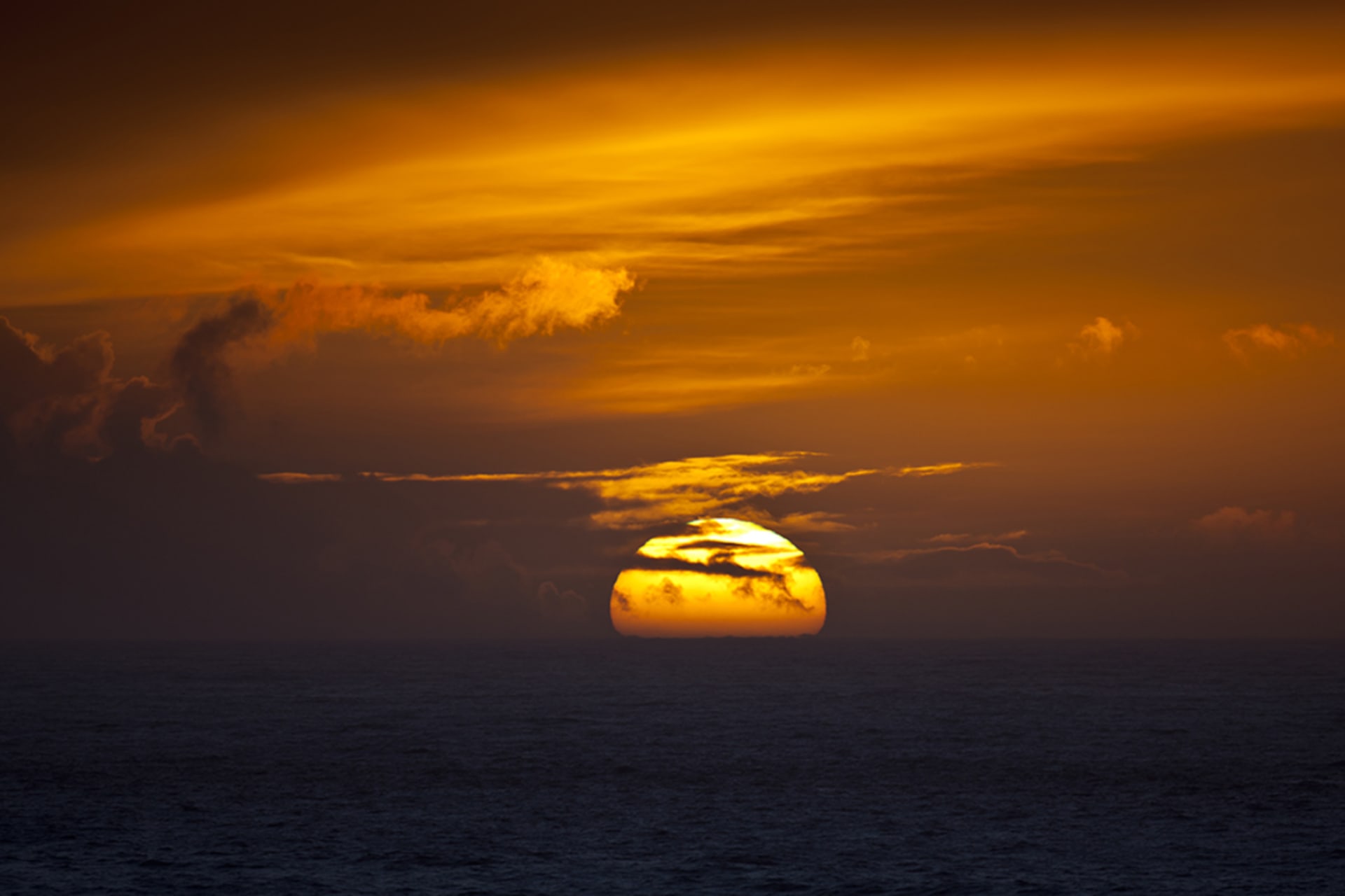 <p>Sun setting over the ocean in North Devon, United Kingdom, on February 7, 2011. </p>
