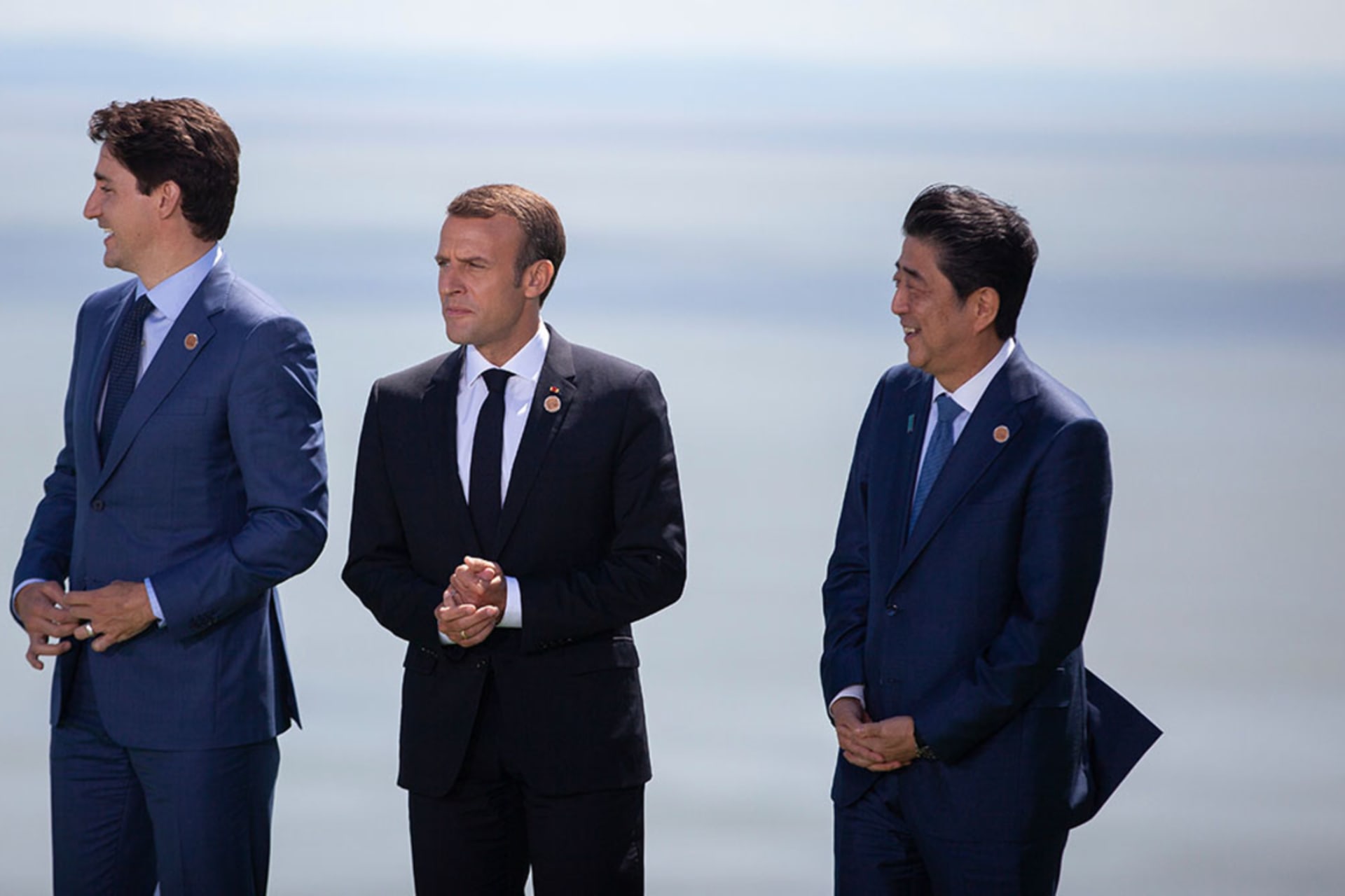 <p>Canadian Prime Minister Justin Trudeau, French President Emmanuel Macron, and Japanese Prime Minister Shinzo Abe pose for a photo during the Group of Seven summit, in Canada, on June 8, 2018.</p>

