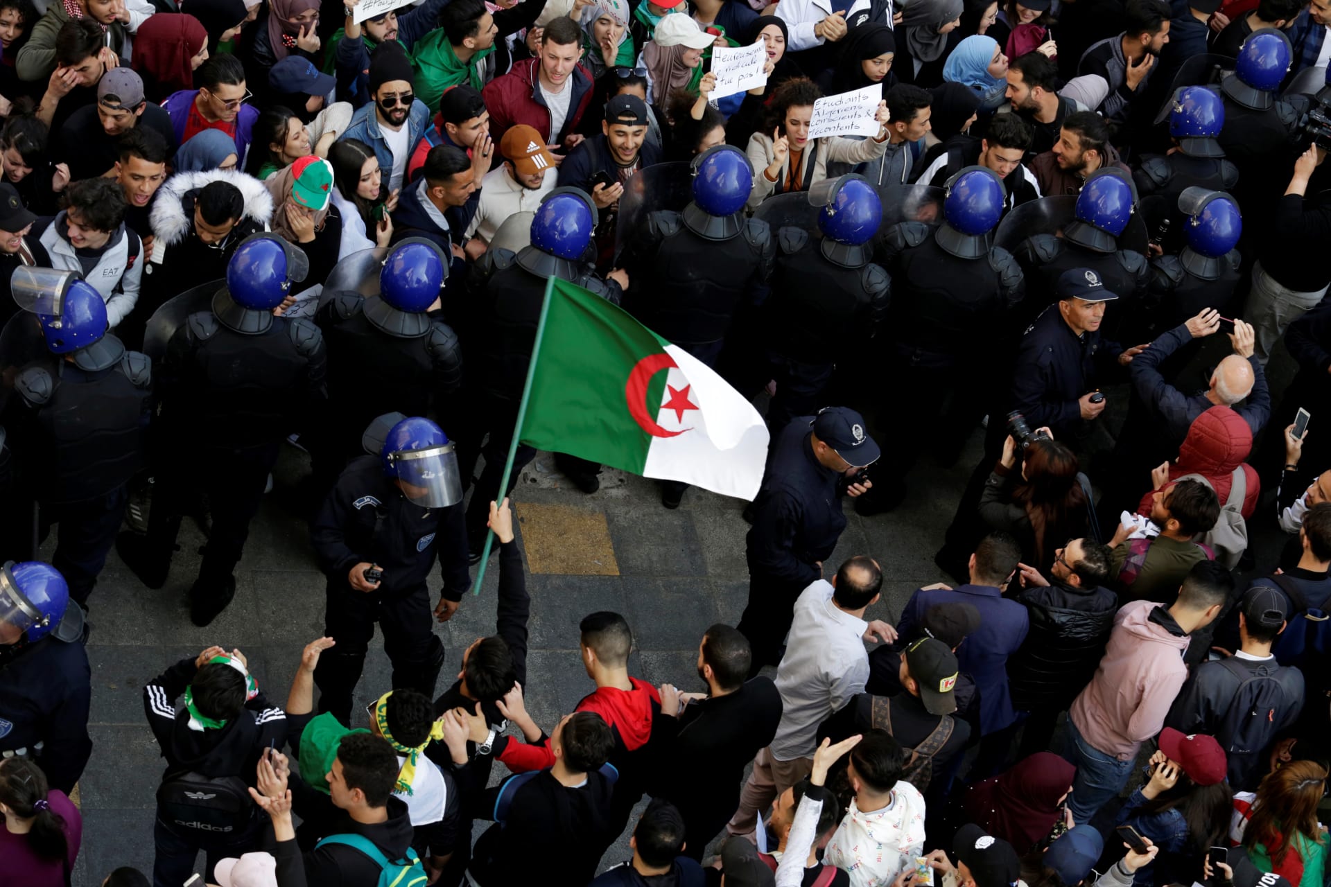 <p>Students take part in a protest in Algiers to denounce an offer by President Abdelaziz Bouteflika to run in elections but not to serve a full term if reelected, on March 5, 2019.</p>
