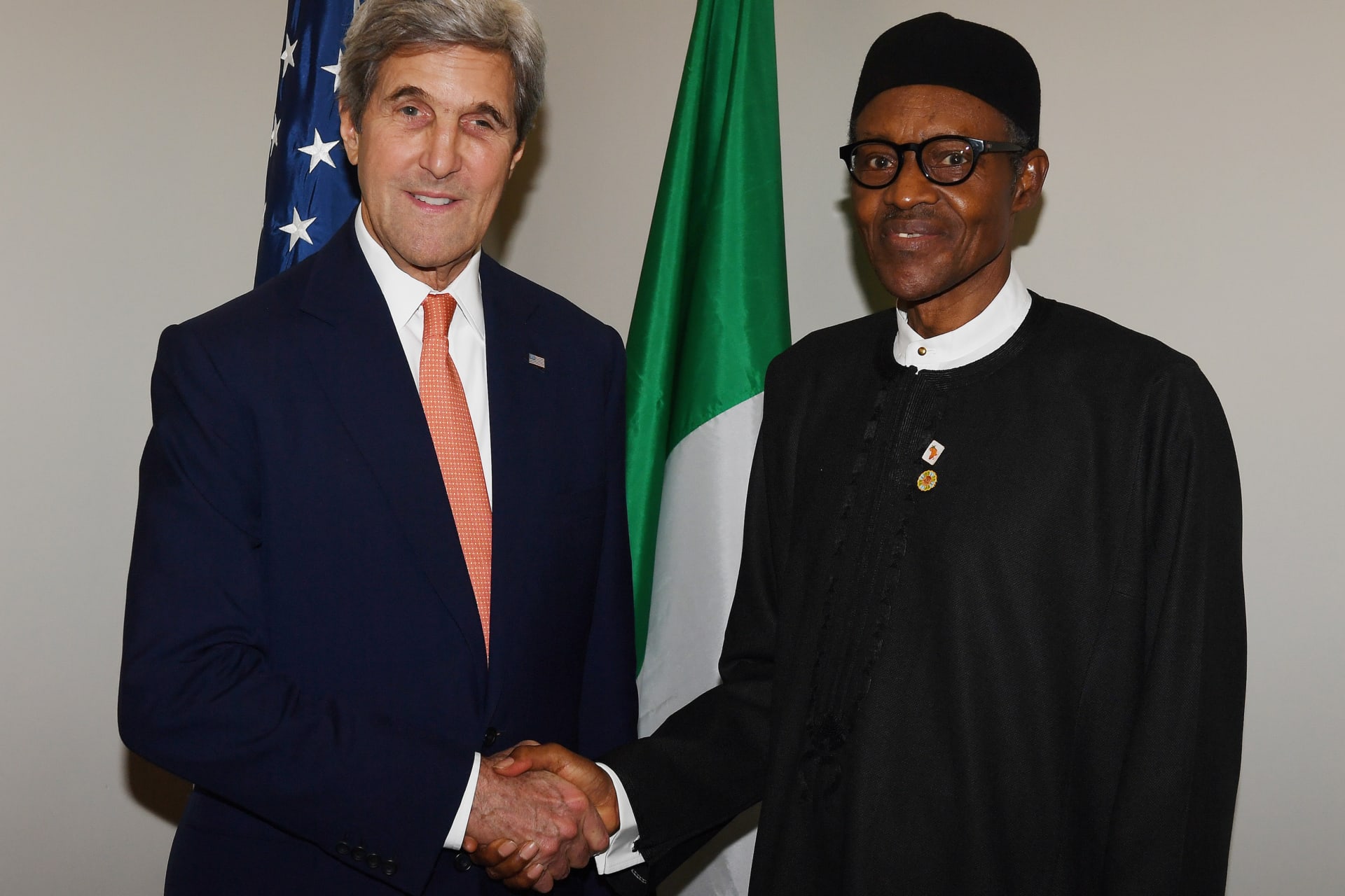 <p>U.S. Secretary of State John Kerry (L) greets Nigerian President Muhammadu Buhari at the COP22 Climate Change Conference in Marrakech, Morocco, on November 16, 2016.</p>
