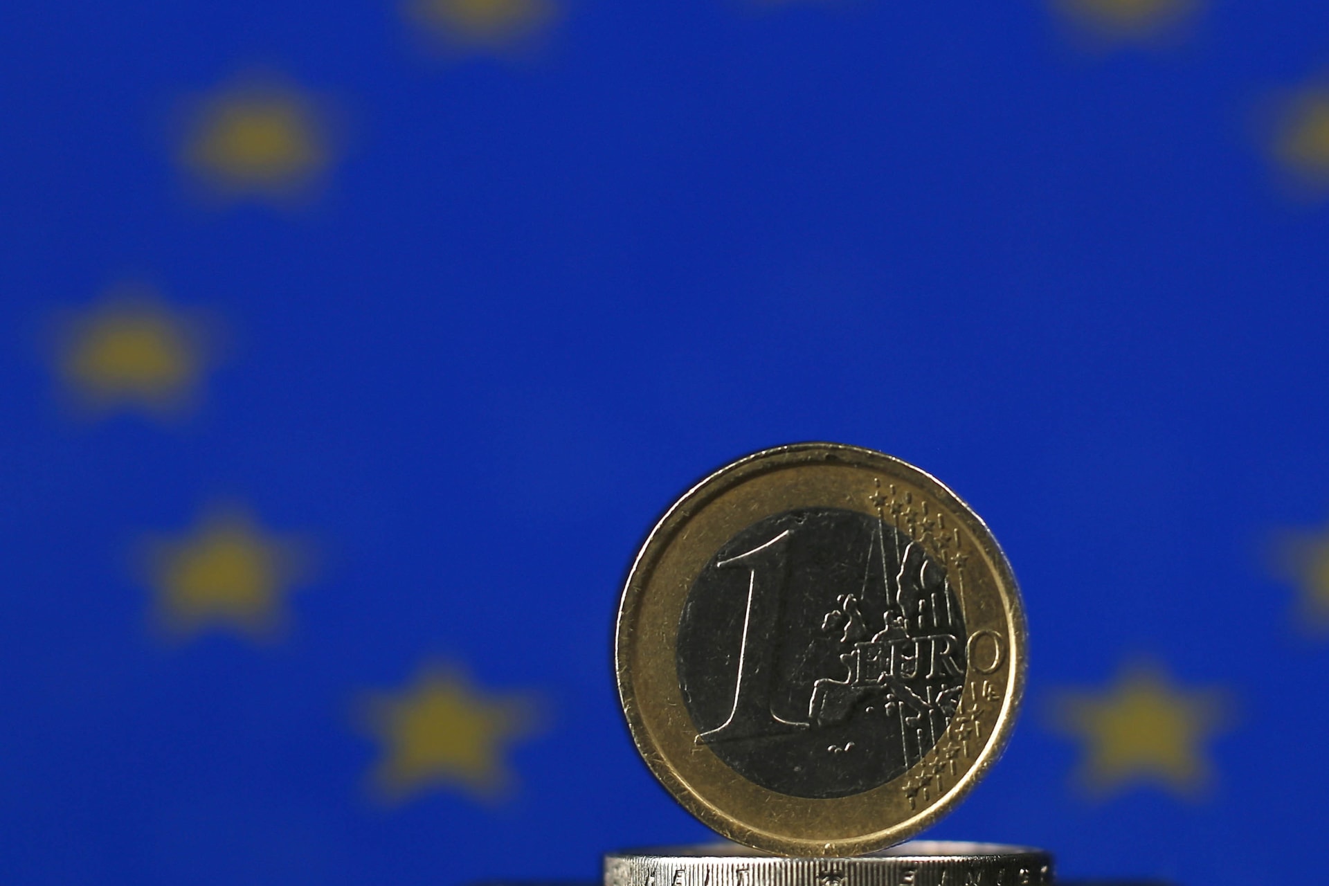 <p>An illustration picture shows Euro coins, photographed in Warngau on April 3, 2013.</p>