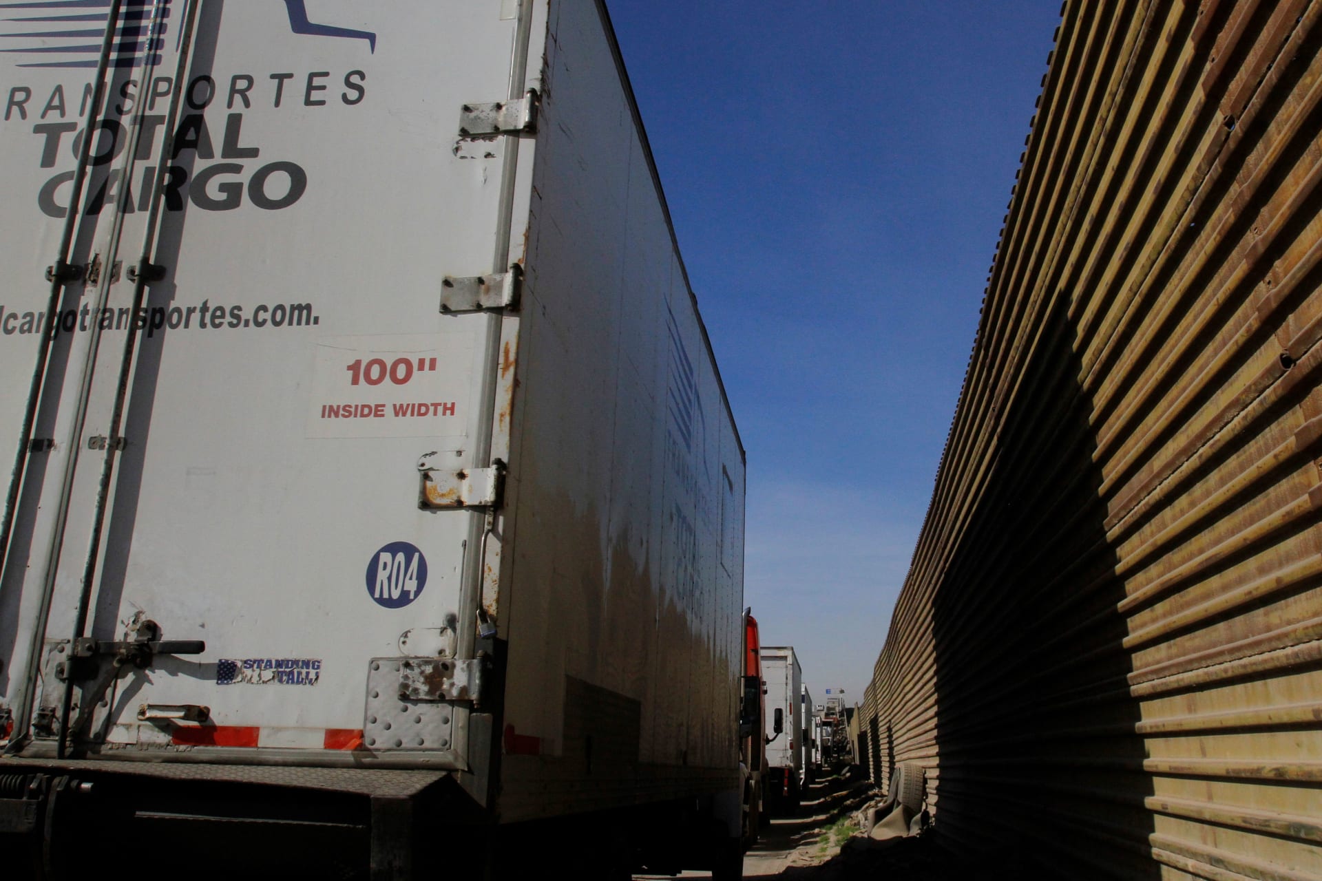<p>Trucks wait in a long queue for border customs control to cross into the U.S. at the Otay border crossing in Tijuana, Mexico, on February 2, 2017.</p>
