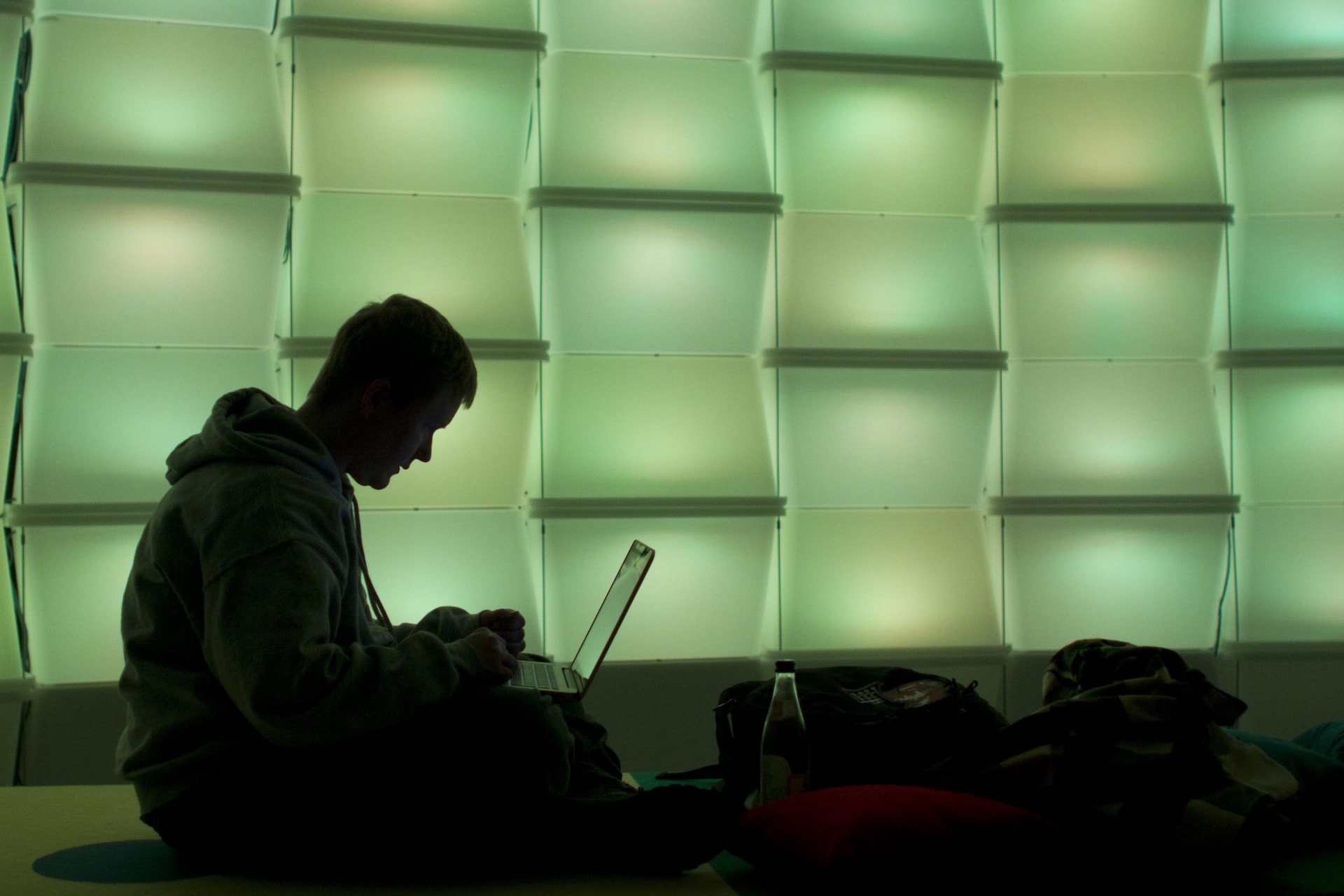 <p>A woman uses a computer in the lounge area of the 27th Chaos Communication Congress (27C3) in Berlin on December 27, 2010.</p>
